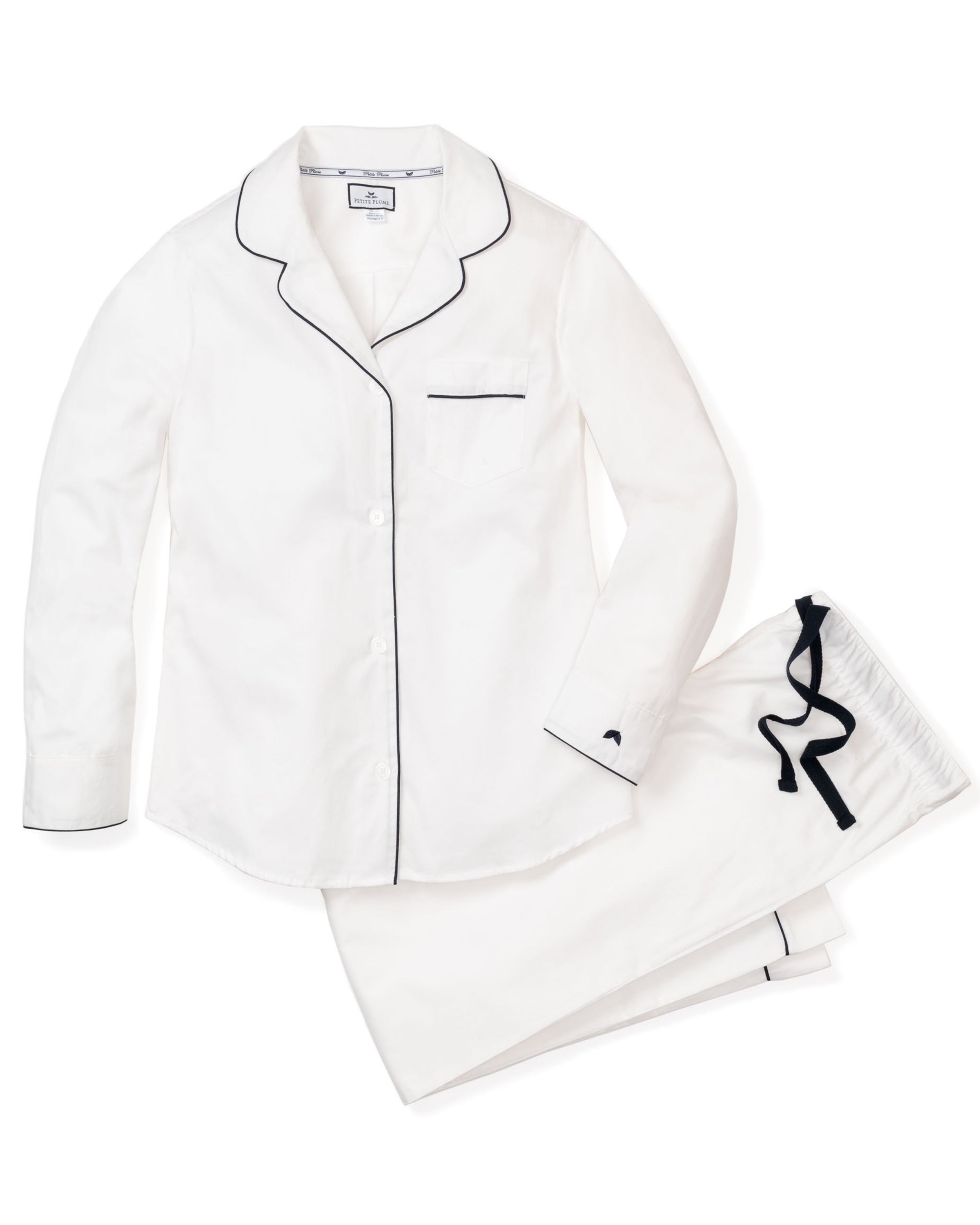 The Petite Plume Womens Twill Pajama Set features a long-sleeved, button-up top with a notched collar and chest pocket, detailed with navy piping. Made from moisture-wicking cotton twill for comfort, the pants have an elastic waistband, a navy drawstring, and are displayed on a white background.