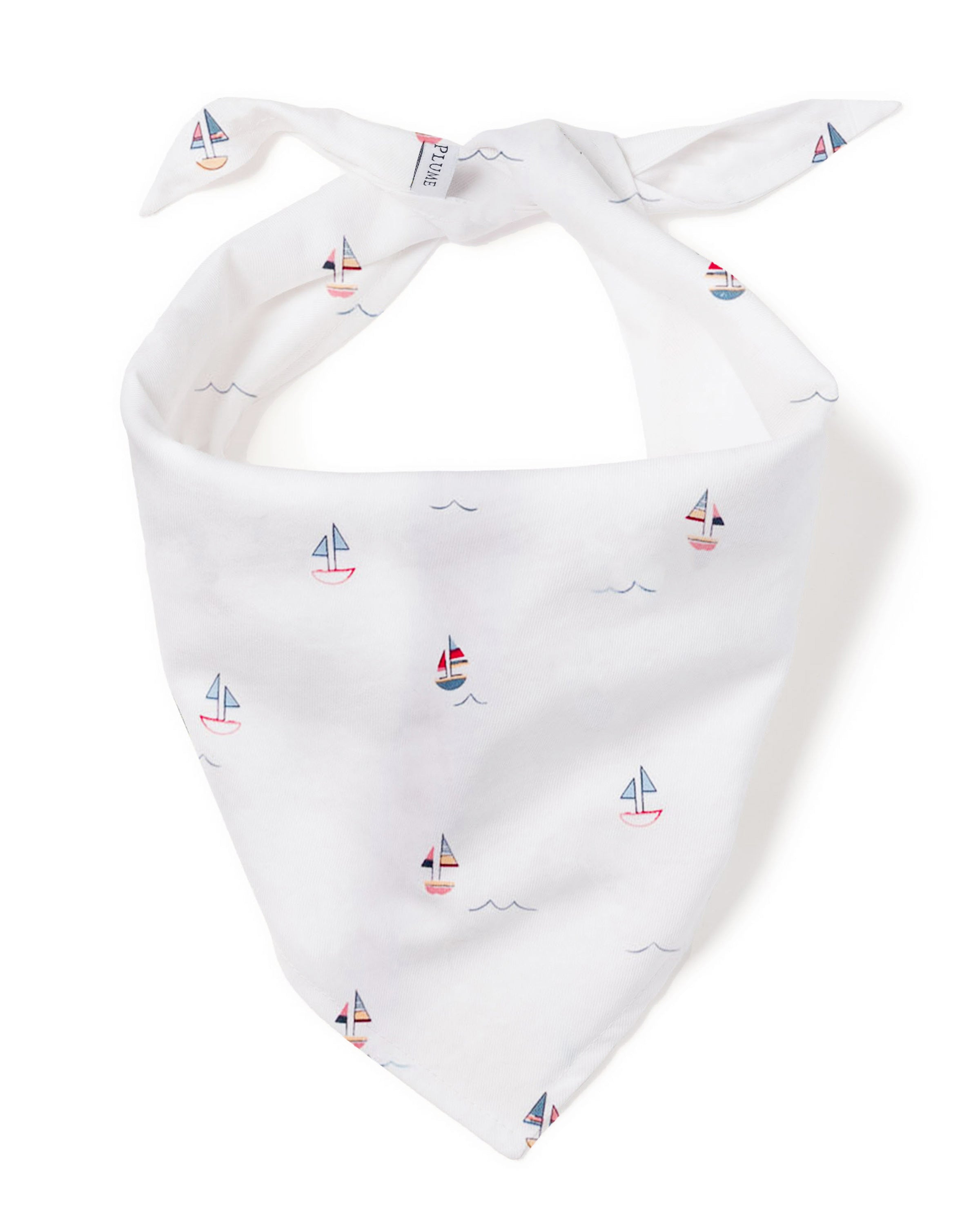 The Dog Twill Bandana in Bateau by Petite Plume features a nautical pattern with sailboats and blue wave lines on white fabric, making it a stylish accessory for pets.