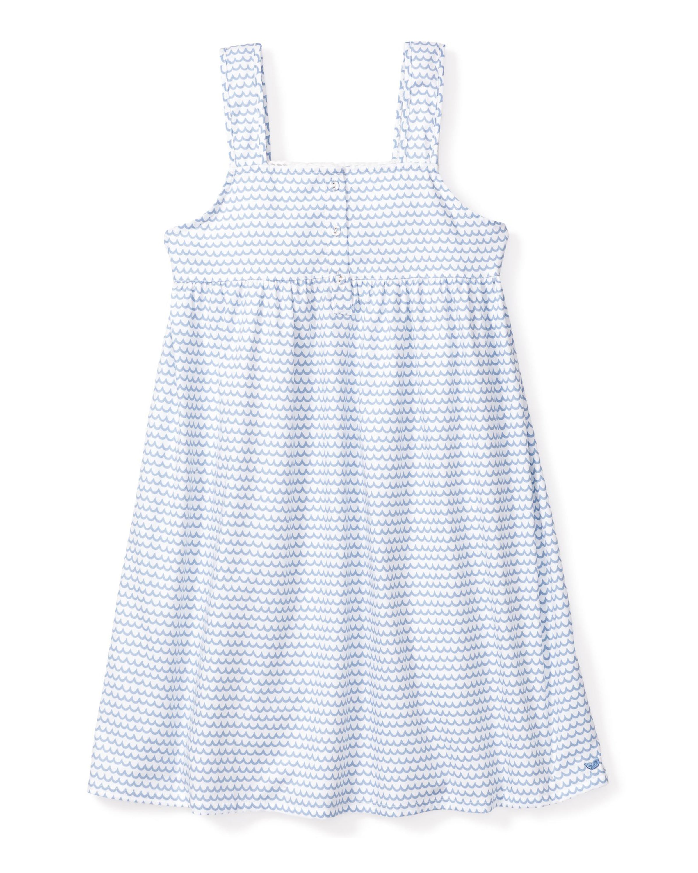 The Girls Twill Charlotte Nightgown in La Mer by Petite Plume is a sleeveless, white dress with blue zigzag patterns. Made of premium cotton, it has thick straps and offers a loose, breezy fit, ideal for summer days.
