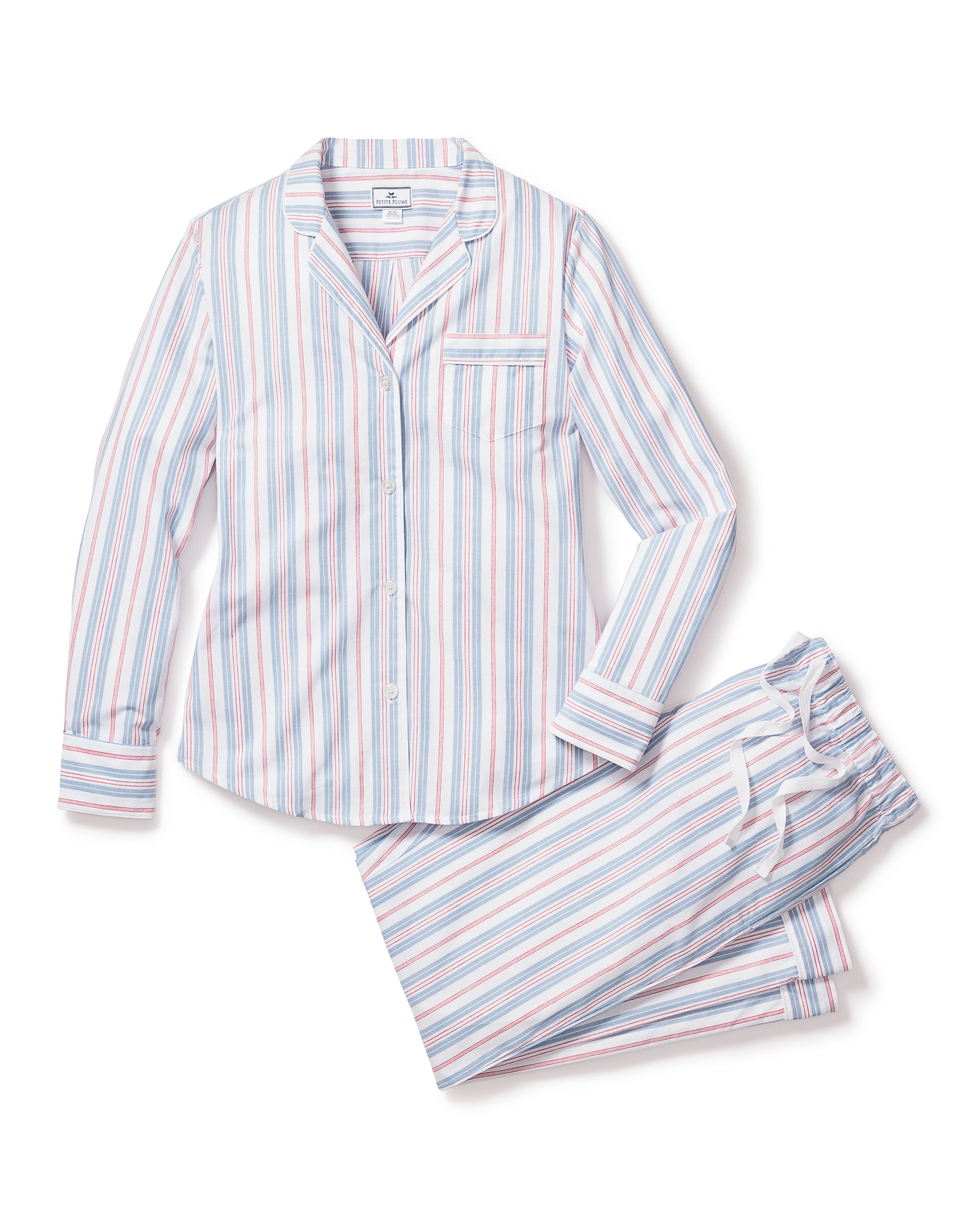 Indulge in luxury with Petite Plumes Womens Twill Pajama Set in Vintage French Stripes, crafted for ultimate comfort. This cotton set includes a long-sleeved, collared top with buttons and a pocket in pink, blue, and white stripes. The pants ensure a perfect fit with a drawstring waist.