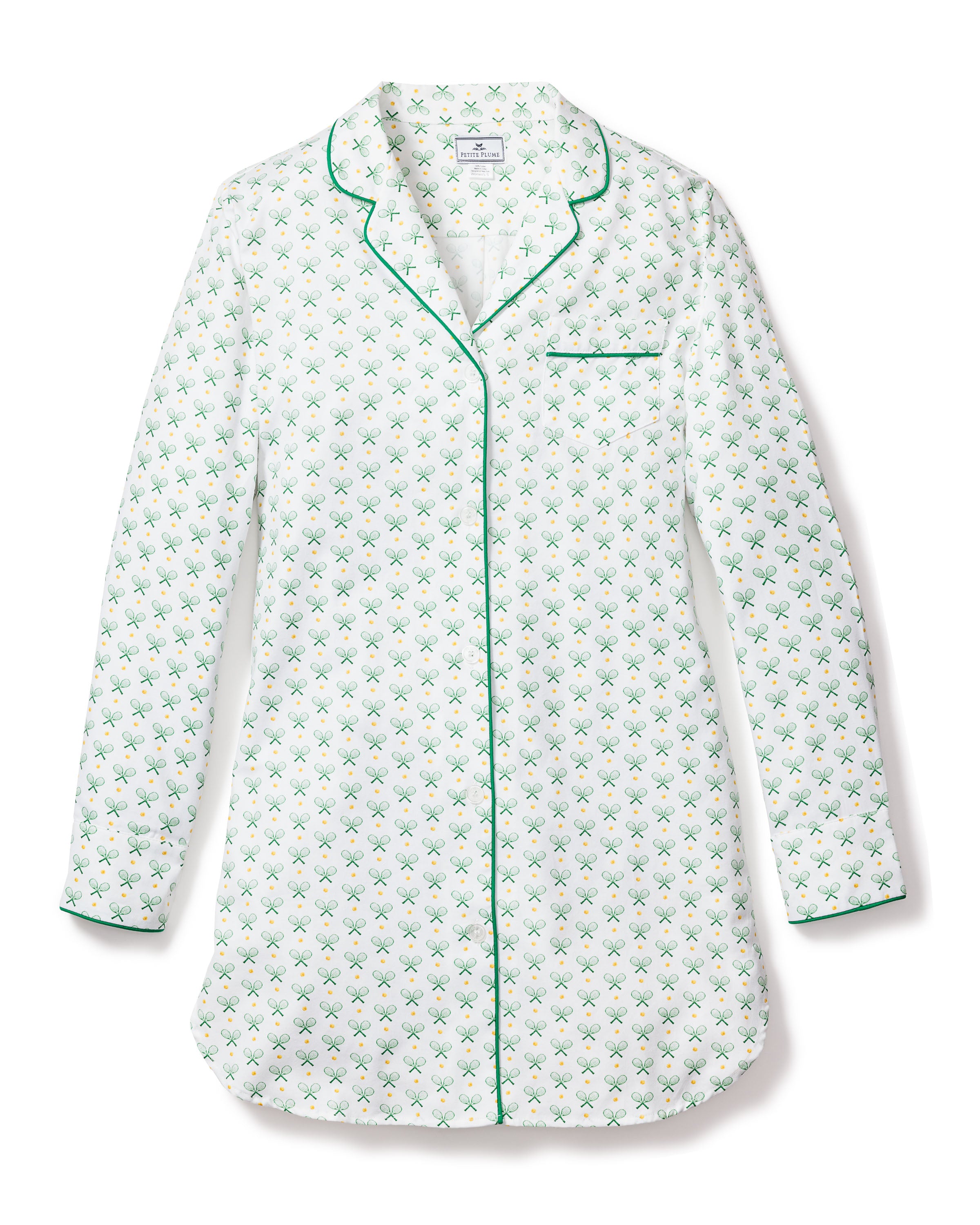 Experience luxury sleepwear with Petite Plumes Womens Twill Nightshirt in Match Point, showcasing a tennis print of rackets and balls. This white long-sleeve piece, accented with green piping, includes a button-down front and breast pocket for ultimate comfort and style.