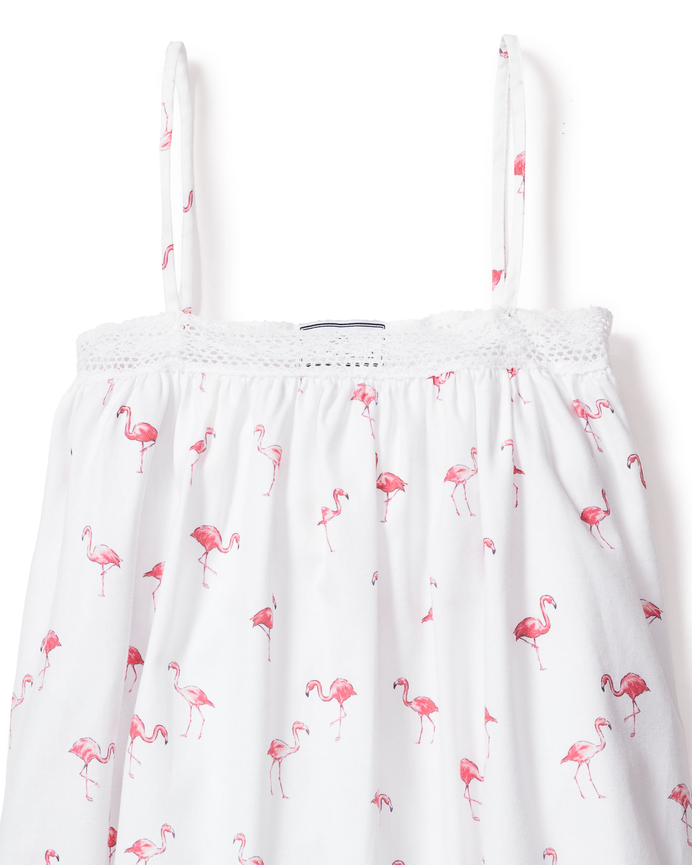 Indulge in the luxurious Girls Twill Lily Nightgown by Petite Plume. This white nightgown, adorned with thin straps and crochet trim, features playful pink flamingos for a tropical bedtime twist.