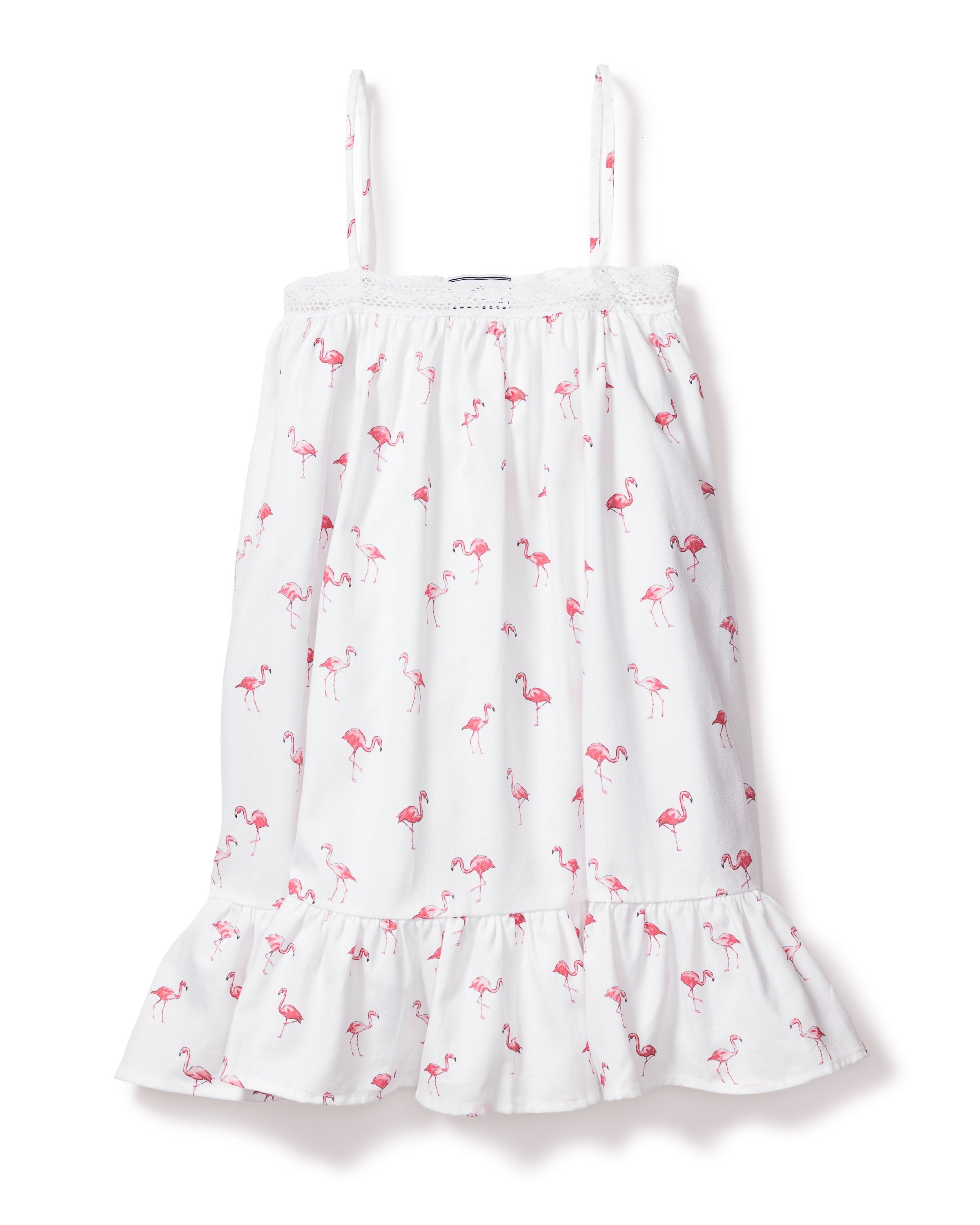 The Girls Twill Lily Nightgown in Flamingos by Petite Plume blends summer charm and cotton comfort. This white sundress features thin straps, a playful pink flamingo pattern, a ruffled hem, and a textured band near the neckline for a breezy yet cozy feel.