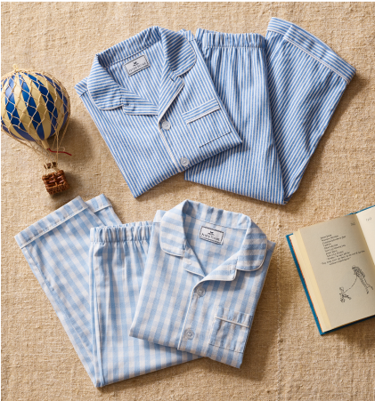Blue and White pajama set on beige background