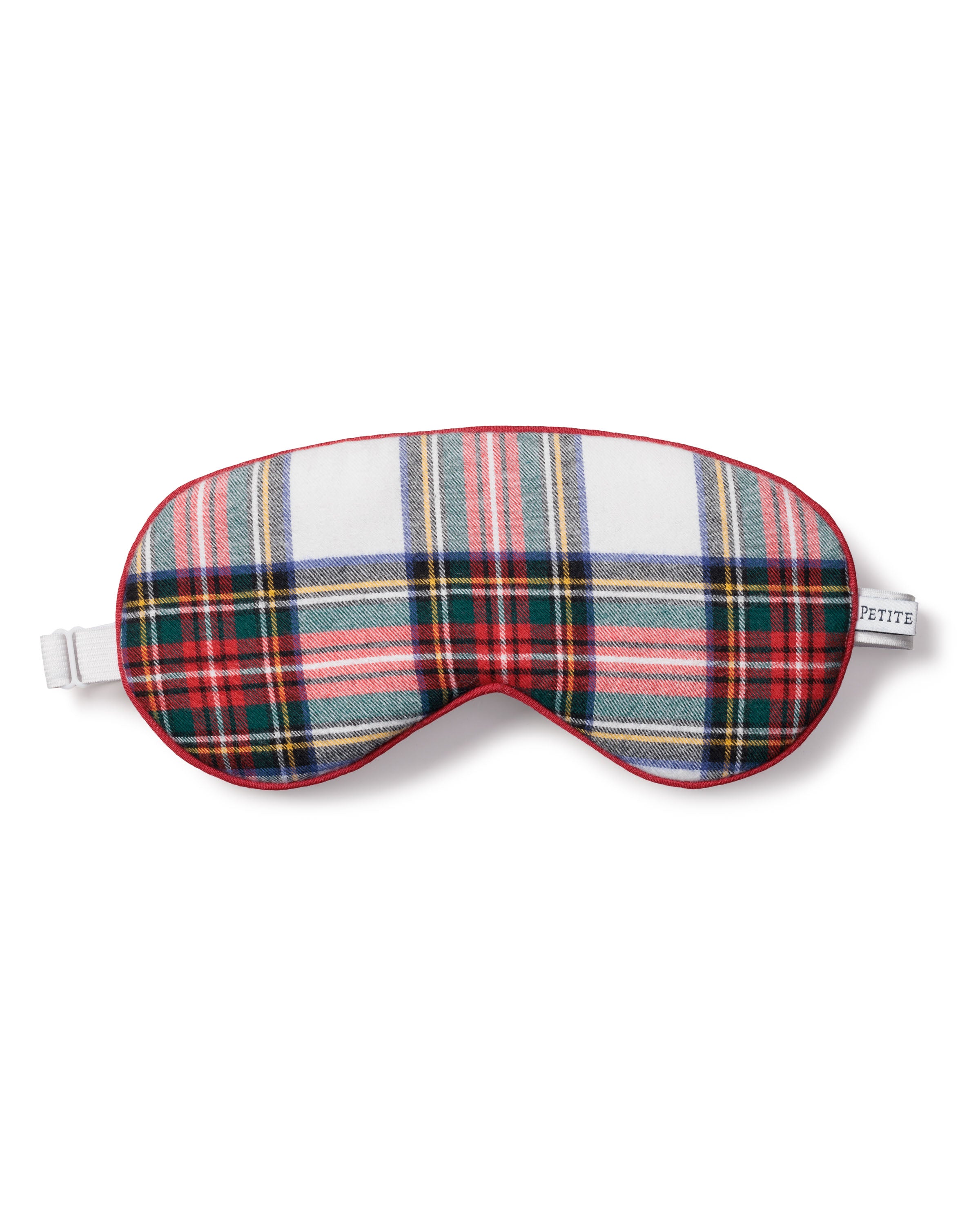 Consider the Adults Brushed Cotton Sleep Mask in Balmoral Tartan by Petite Plume as a holiday gift. This plaid mask features red, green, and white hues with a chic red trim and an adjustable white strap. Perfect for those seeking matching and elegant eye masks for cozy nights.