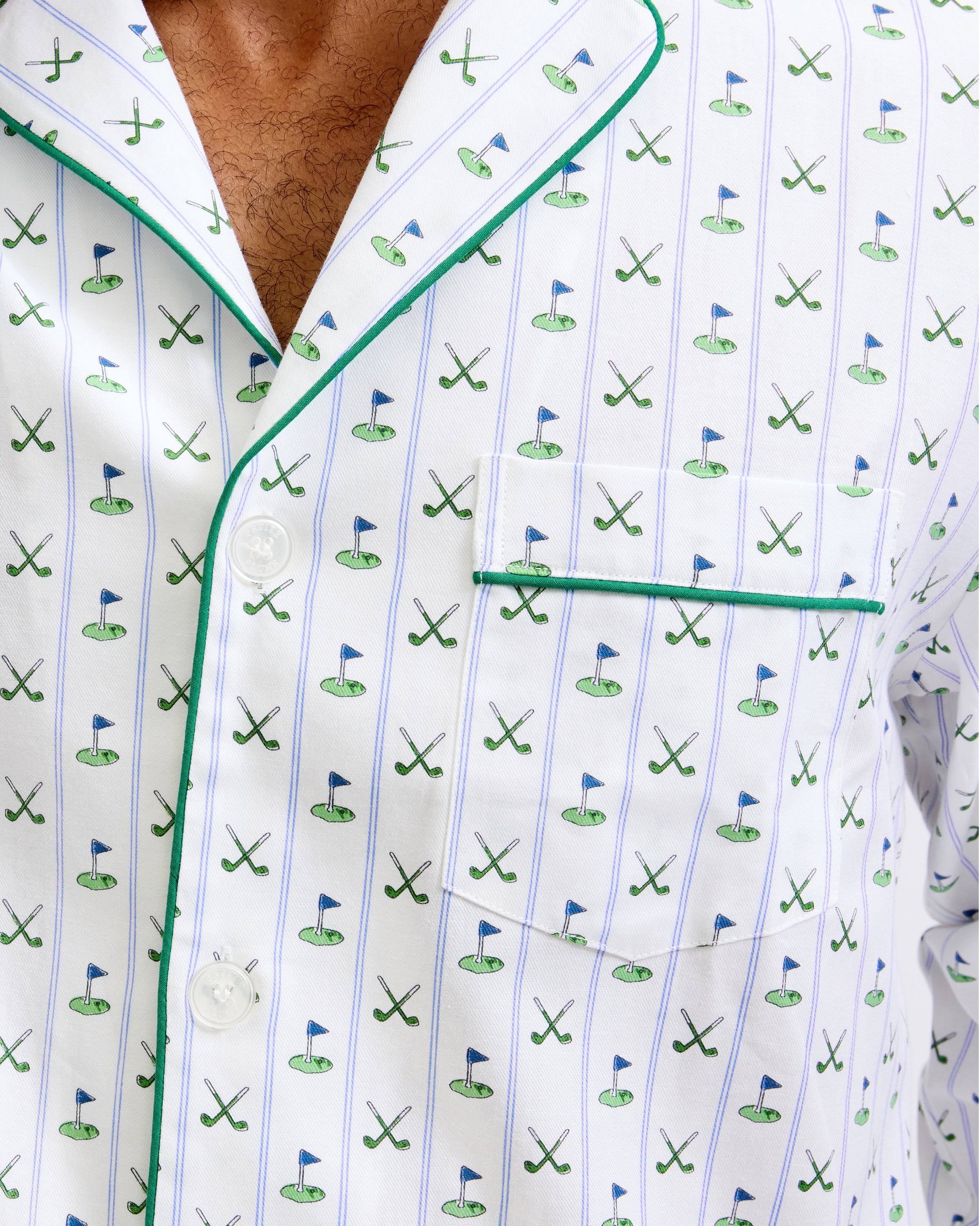 Men's Twill Pajama Set in Fairway Stripe, featuring a small green anchor pattern, green piping, chest pocket, and elastic waistband with green drawstring pants. The set is displayed neatly on a white background.