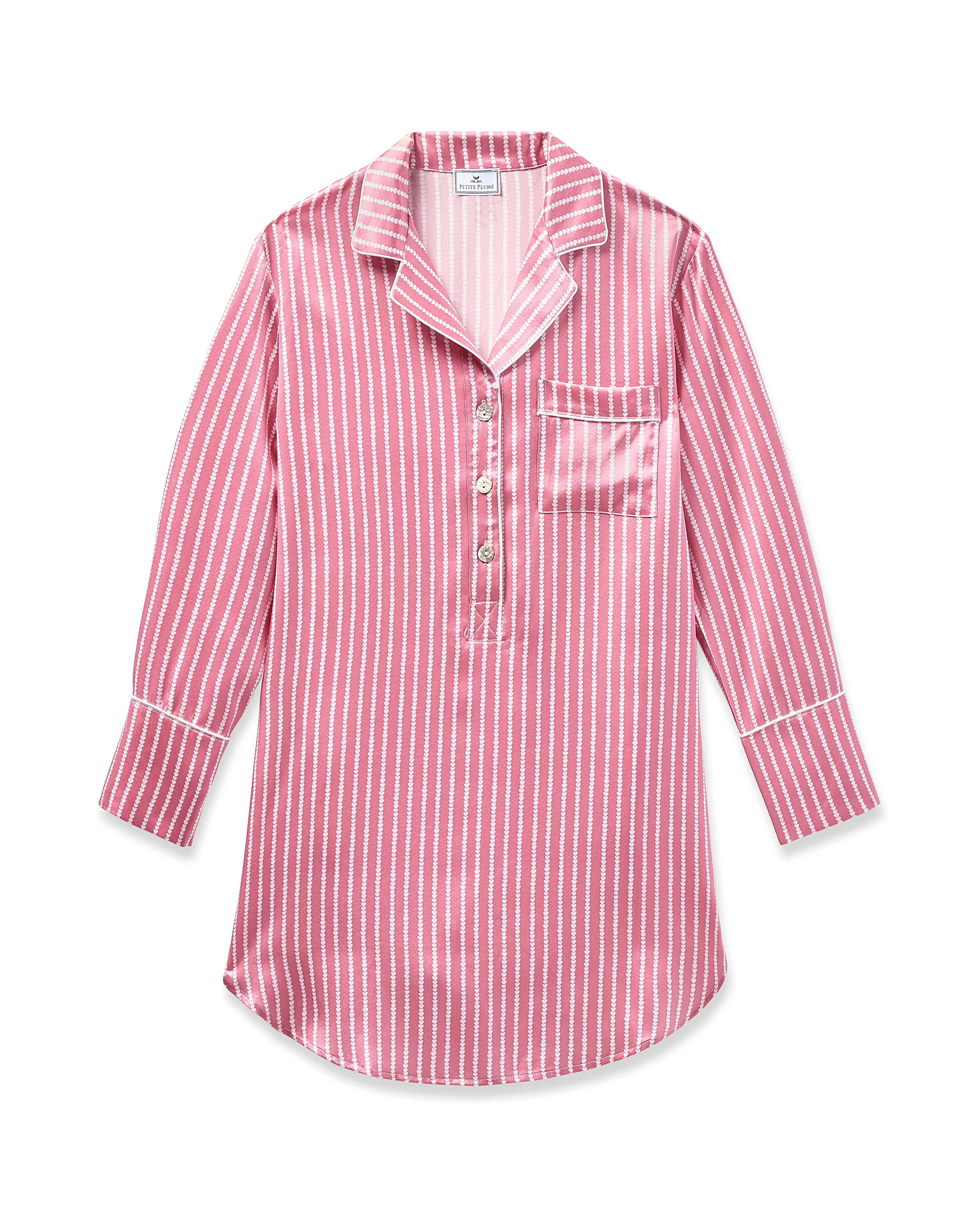 The Womens Silk Nightshirt in Love Lines by Petite Plume is a luxurious pink and white striped mulberry silk pajama shirt with a collar, three buttons, long sleeves, and a left chest pocket. The soft fabric with a slight sheen epitomizes exquisite sleepwear.