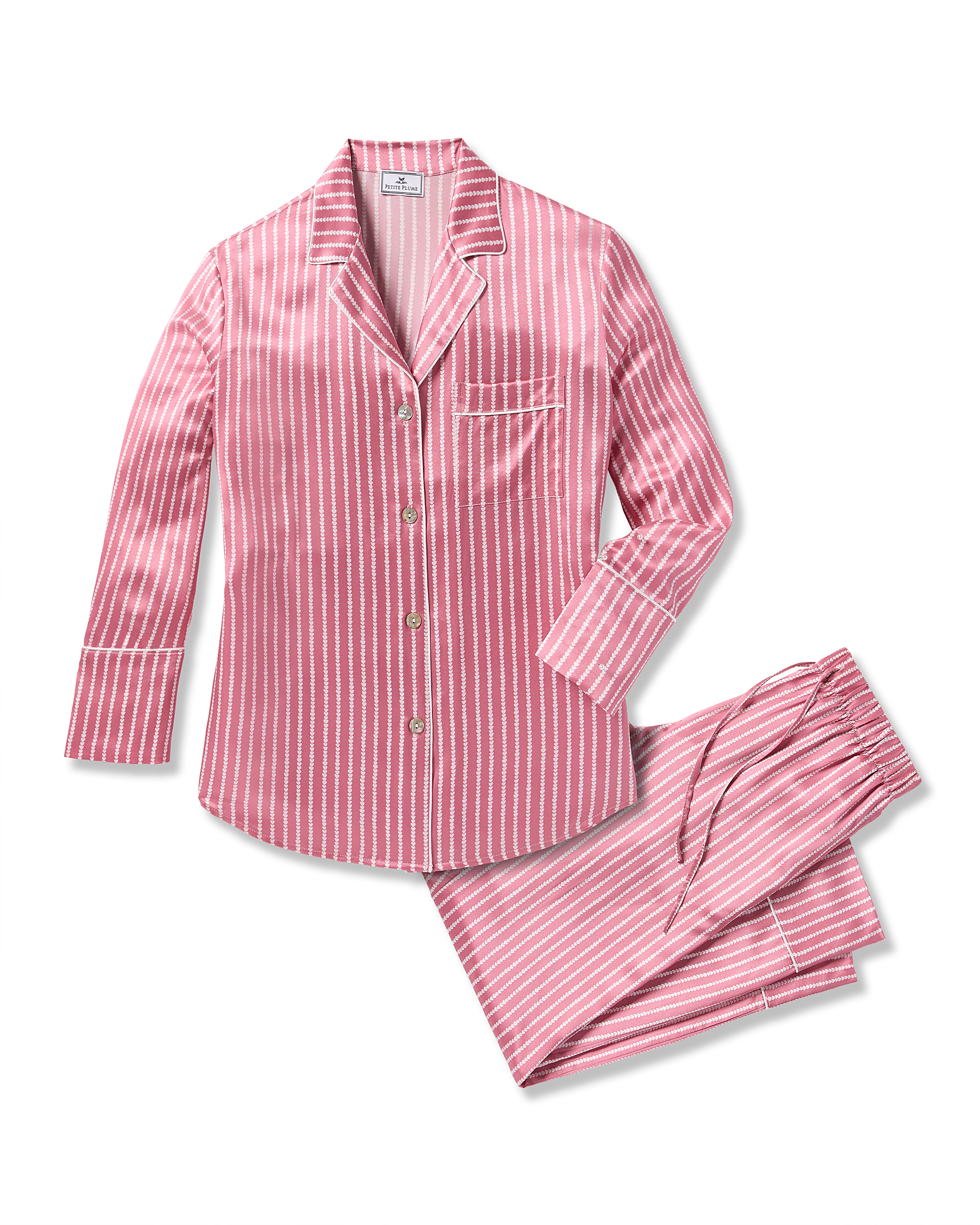 Indulge in luxury with Petite Plumes Womens Silk Pajama Set in Love Lines, featuring red and white vertical stripes. This hypoallergenic set is crafted from Mulberry silk, includes a button-up top with collar, pocket, long sleeves, and matching pants for a restful night.