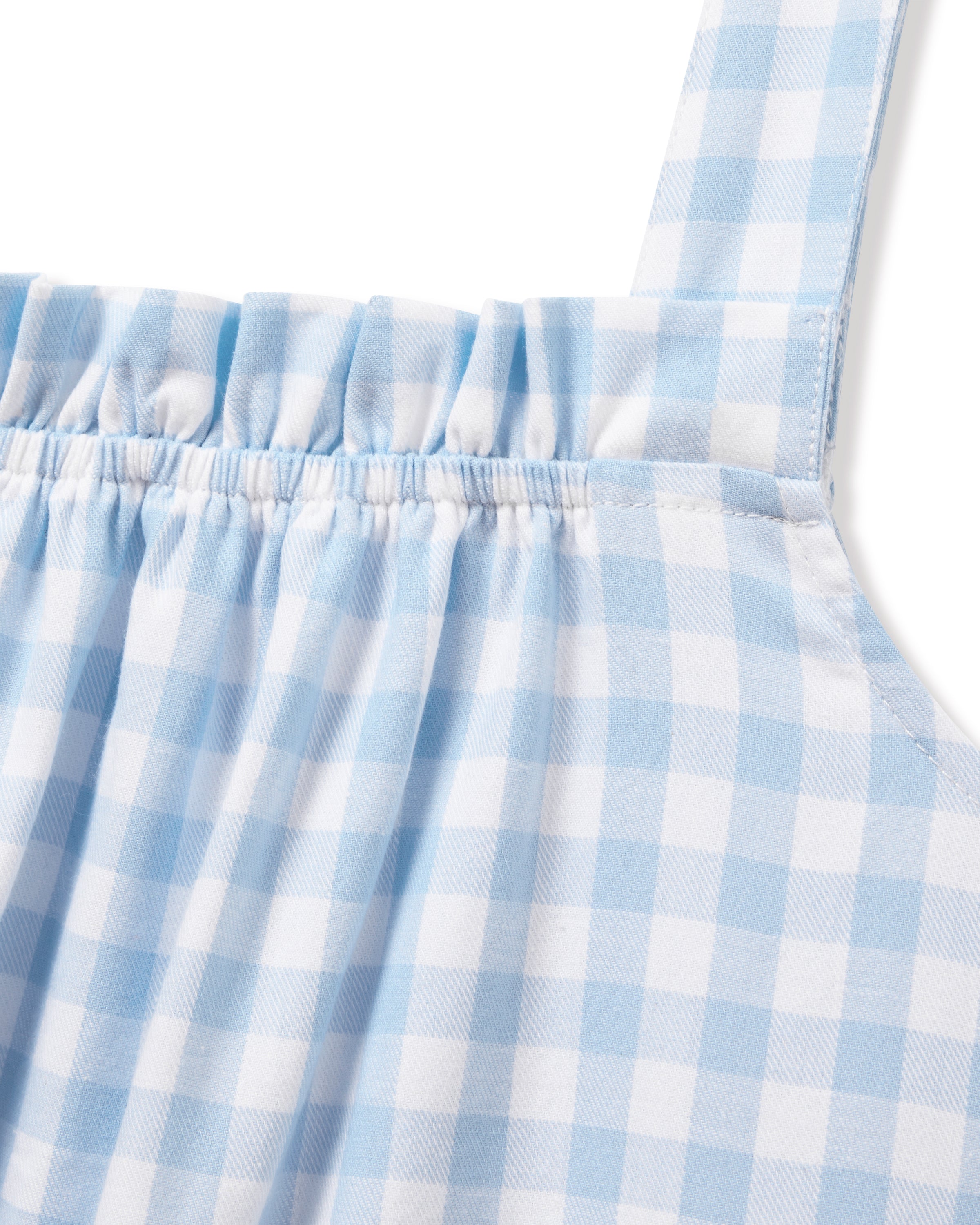 The Women's Twill Annabelle Nightgown in Light Blue Gingham features wide shoulder straps, a light blue and white gingham pattern, a gathered elastic neckline, relaxed fit, and above-knee length.
