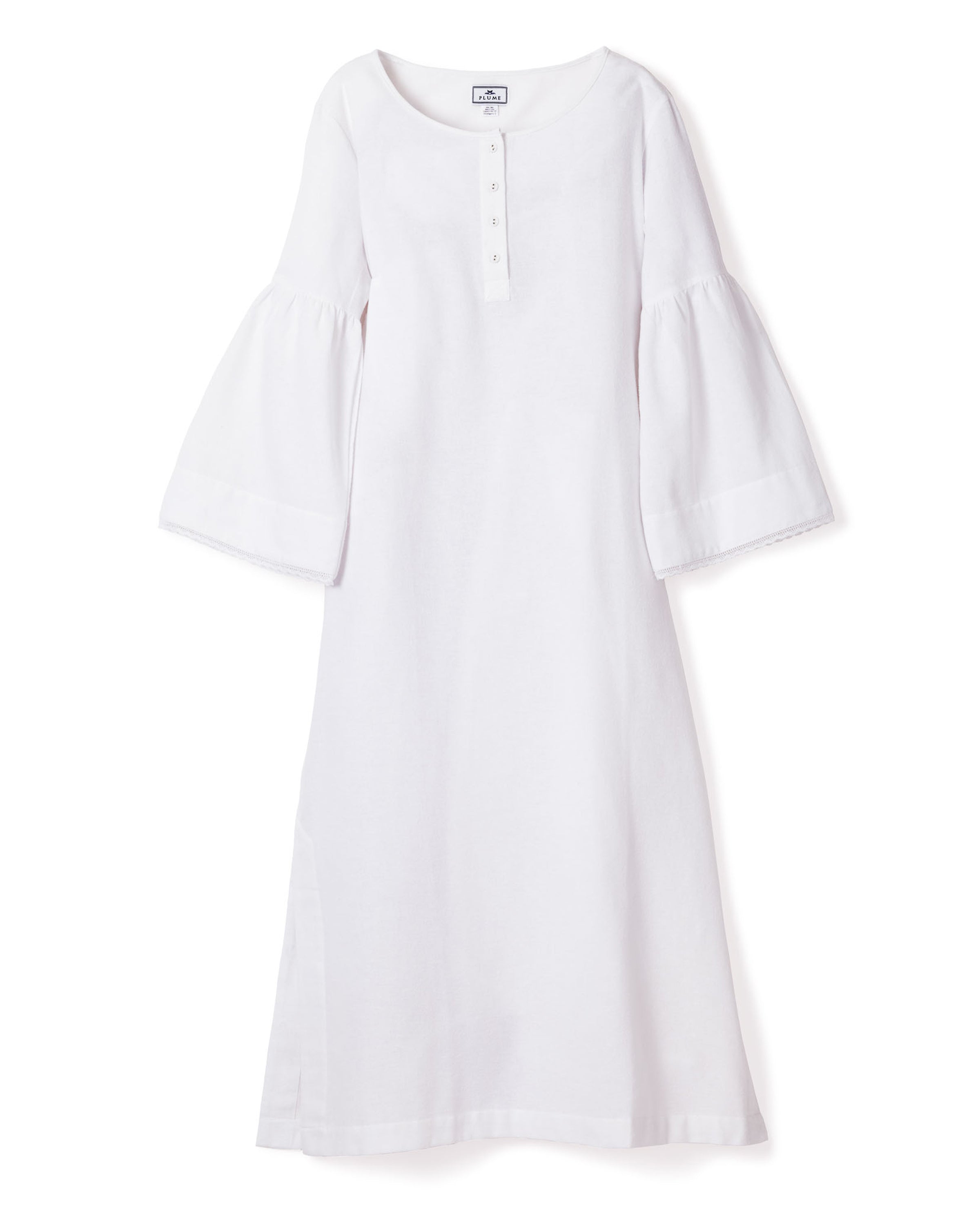 The Womens Flannel Seraphine Nightgown in White by Petite Plume is a long-sleeved, buttoned-neckline dress with bell sleeves. Made from high-quality cotton, it combines simplicity and elegance with a loose fit and modest length.