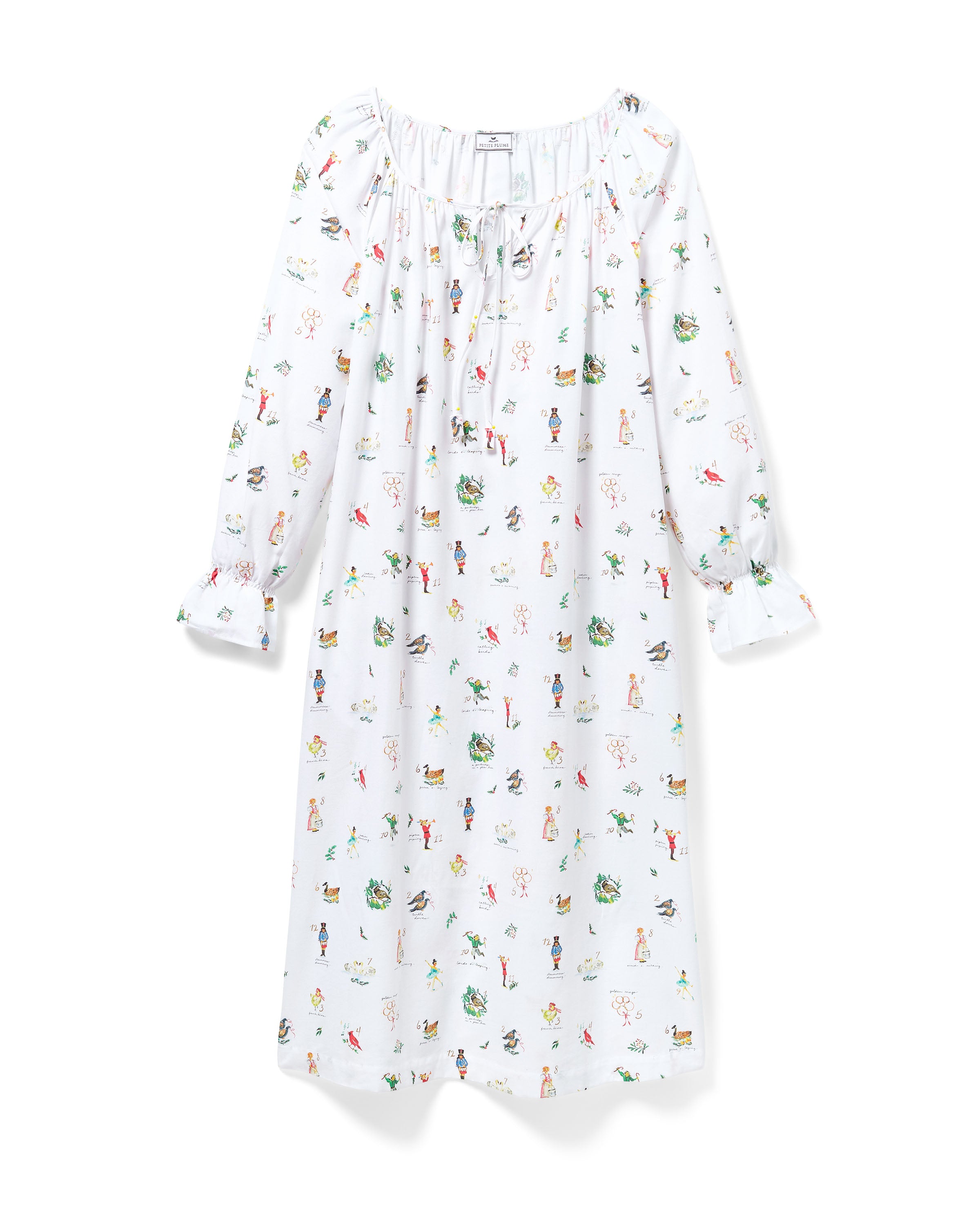 The Women's Twill Delphine Nightgown in 12 Days of Christmas is a white, long-sleeve nightgown with a gathered neckline, small bow tie, and a festive print inspired by the 12 Days of Christmas.
