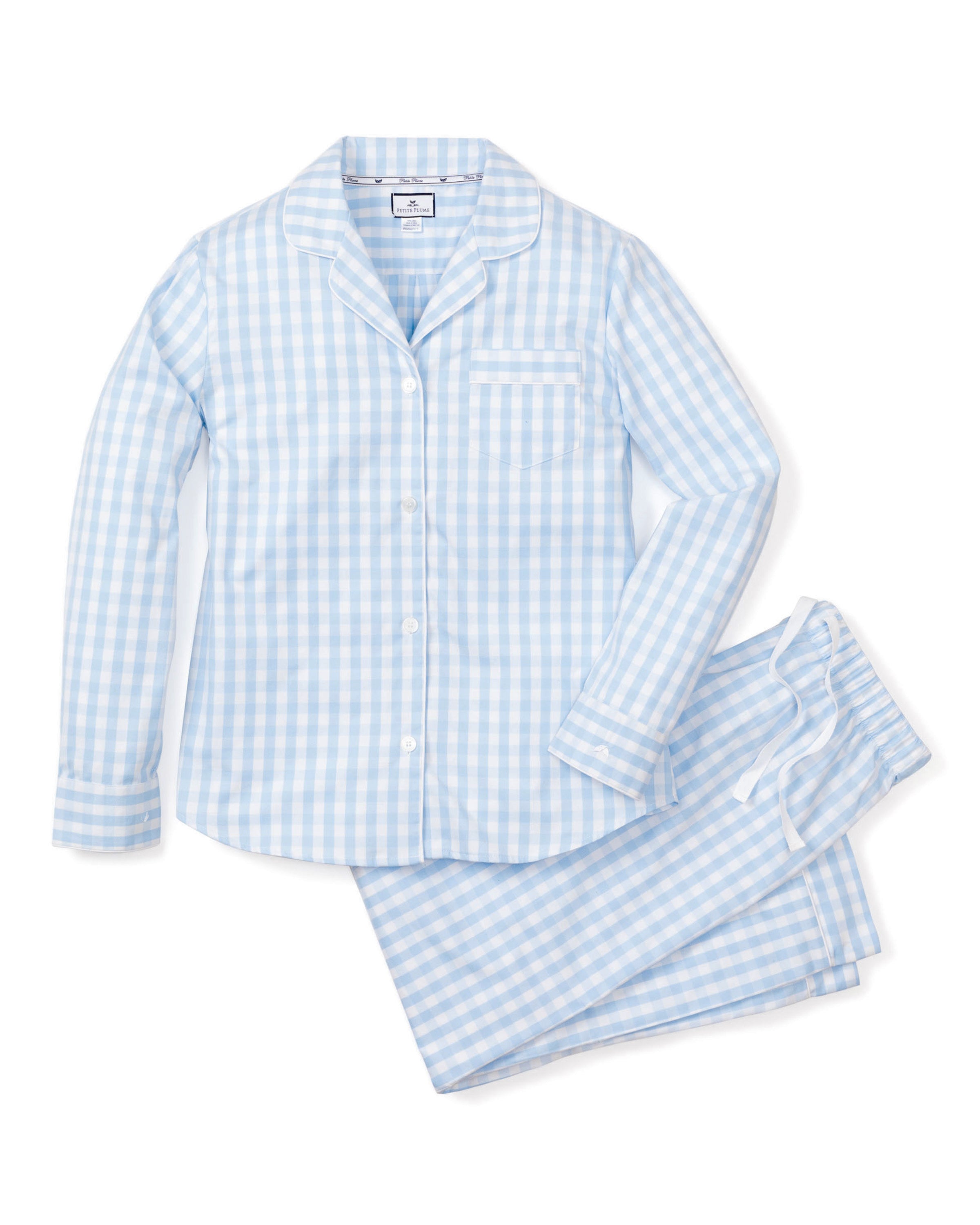 Close-up of Petite Plumes Womens Twill Pajama Set in Light Blue Gingham fabric featuring an elastic waistband and a white, textured drawstring tied in a bow at the front.