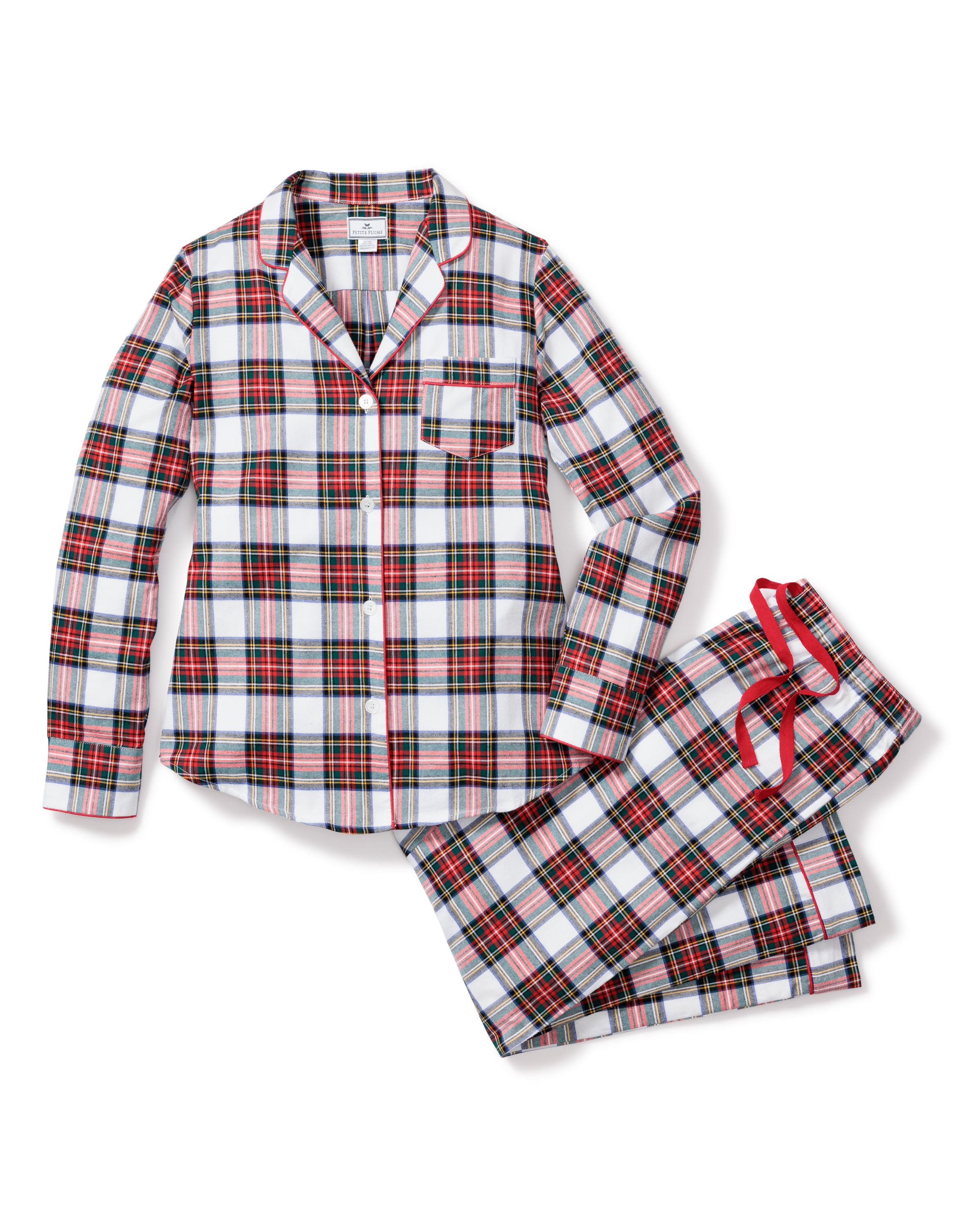 Petite Plumes Womens Brushed Cotton Pajama Set in Balmoral Tartan features a cozy plaid design with a long-sleeve button-up shirt and pants. Made from cotton twill, it showcases a classic white, red, and green tartan with red piping and drawstring for timeless style.