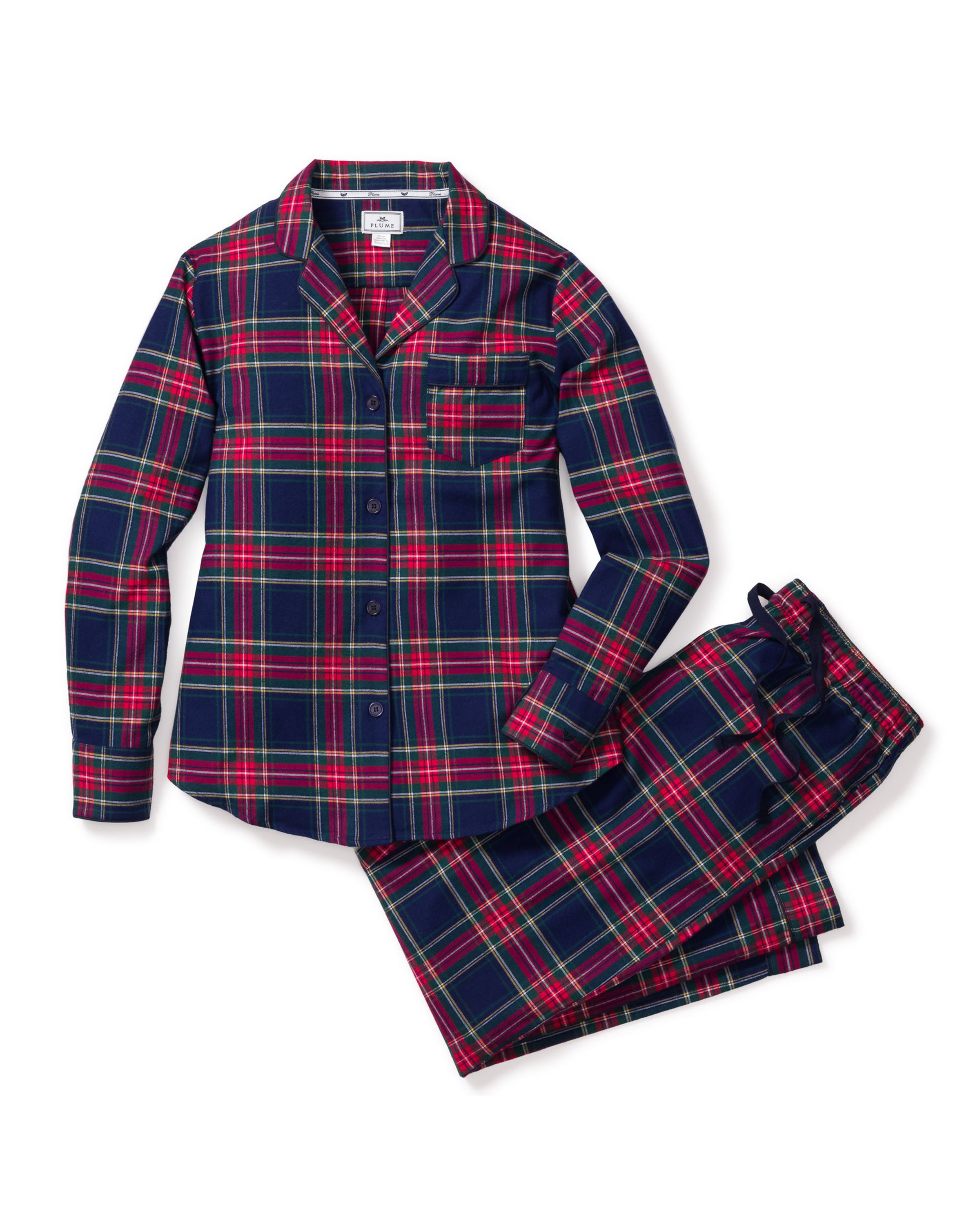 The Womens Brushed Cotton Pajama Set in Windsor Tartan by Petite Plume includes a long-sleeved button-up shirt and pants with an adjustable drawstring, crafted from 100% cotton twill. The fabric features a blue, red, and green plaid pattern.