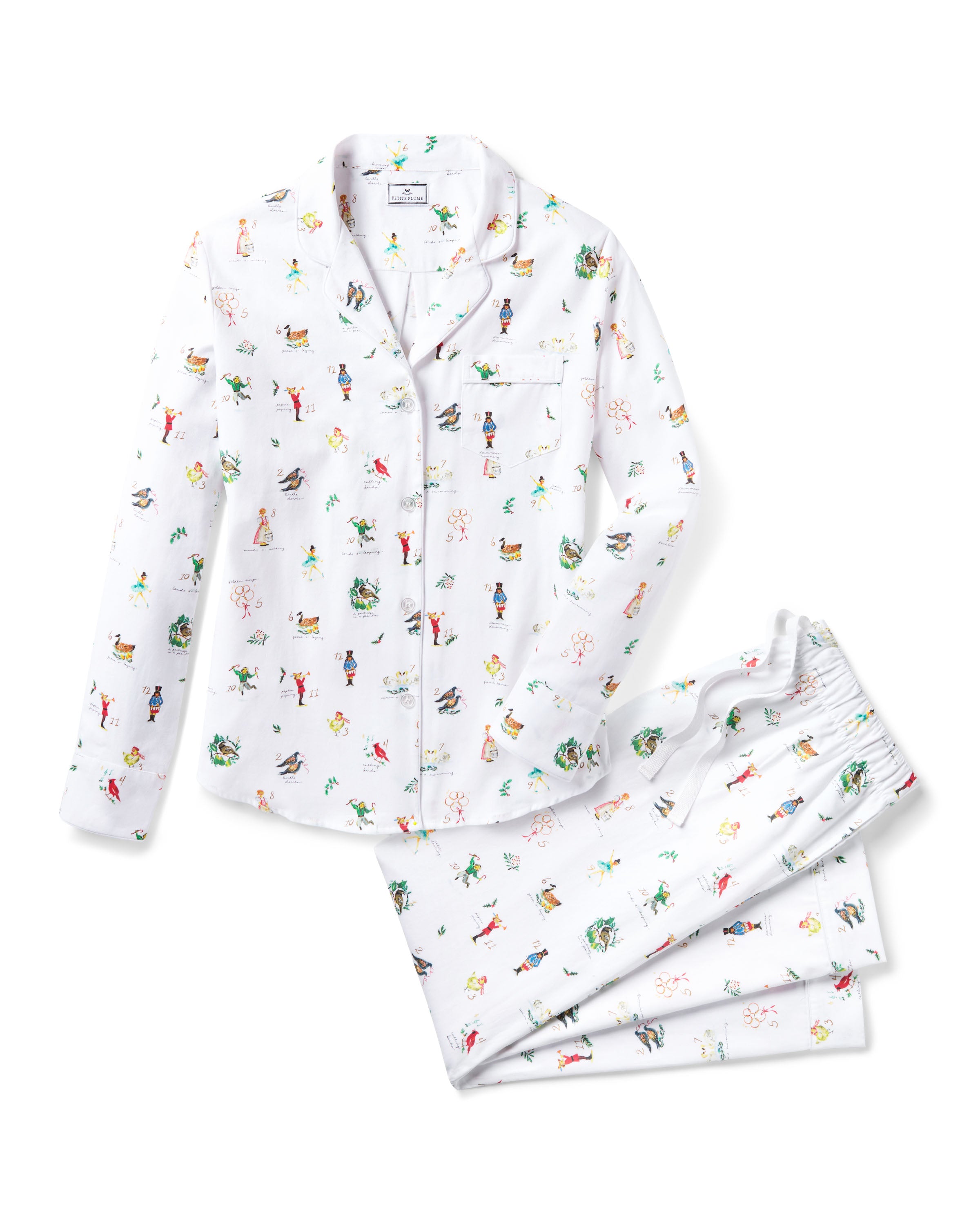 Women's Twill Pajama Set in 12 Days of Christmas features a white button-up long sleeve top and pants, adorned with a playful pattern of multicolored animals and palm trees.
