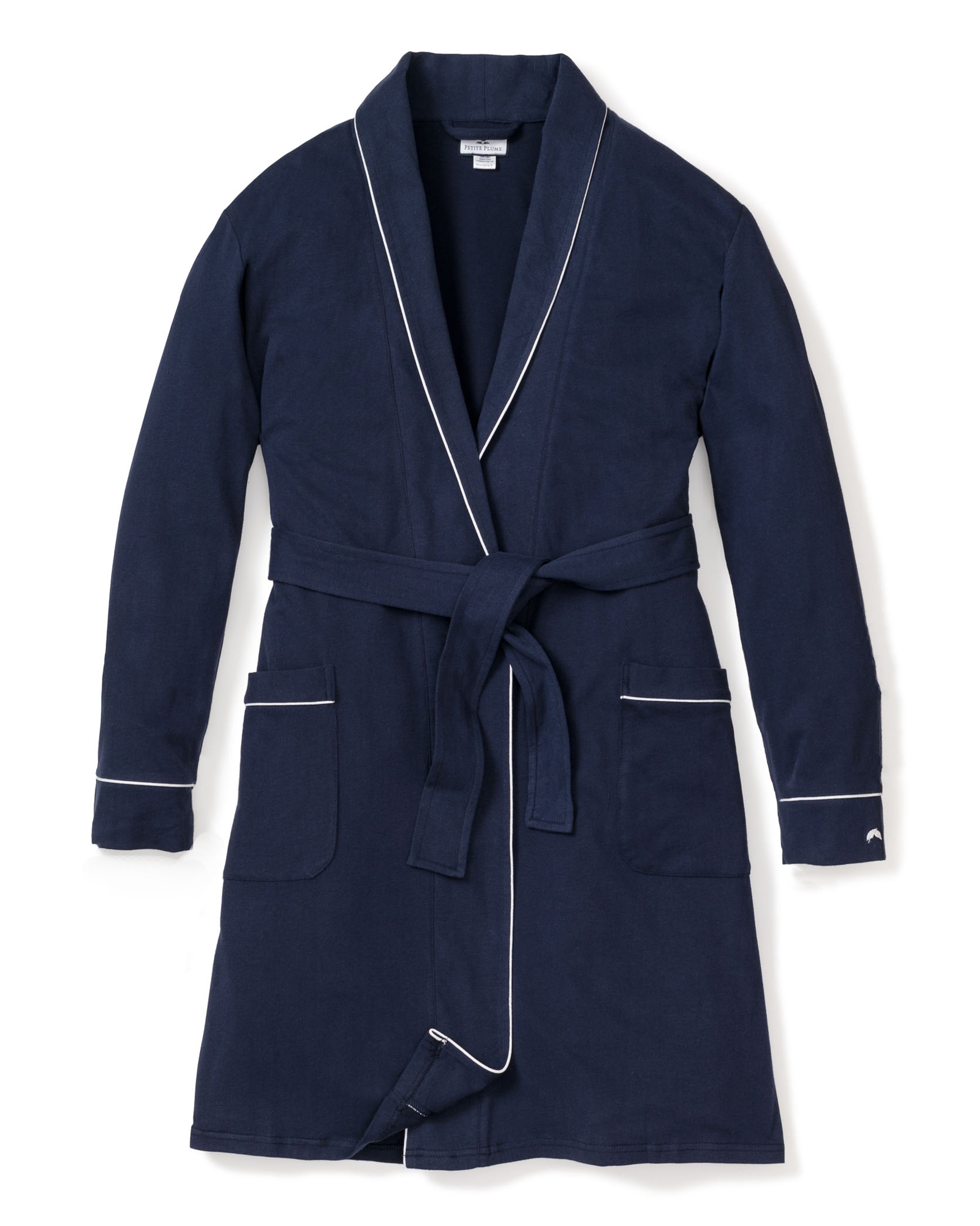 The Womens Flannel Robe in Navy by Petite Plume features a moisture-wicking weave with white piping, two front pockets, and a belt tie for comfort and style. Its elegantly displayed flat against a white background.