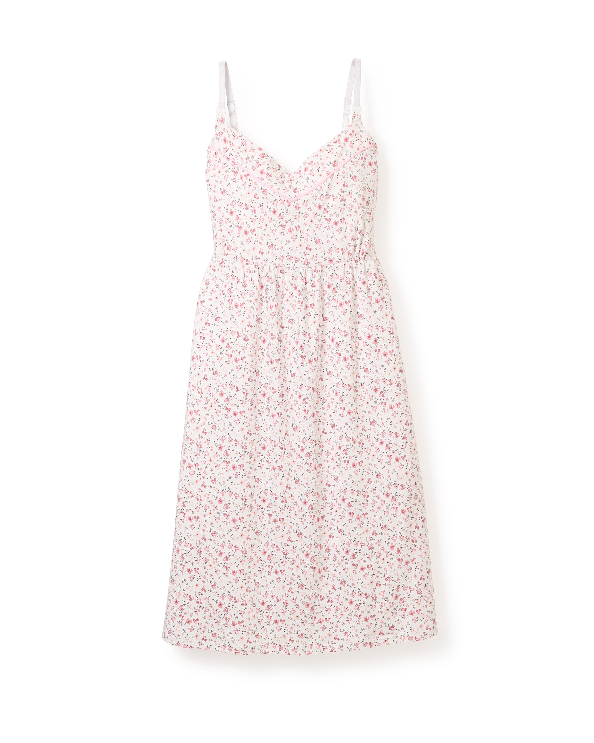 The Womens Pima Maternity Nightgown in Dorset Floral by Petite Plume is a sleeveless, mid-length white maternity dress with thin straps and a pink floral pattern. Made of luxurious Peruvian Pima cotton, it has a fitted bodice and slightly flared skirt, offering nursing mothers comfort and elegance.