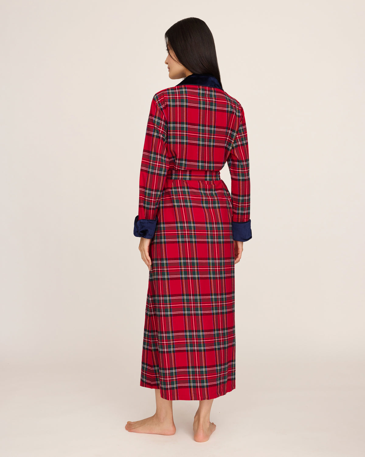 The Women's Long Robe with Velvet Trim in Imperial Tartan features a red plaid pattern, navy blue velvet collar and cuffs, matching belt, and two front pockets, displayed flat on a white background.