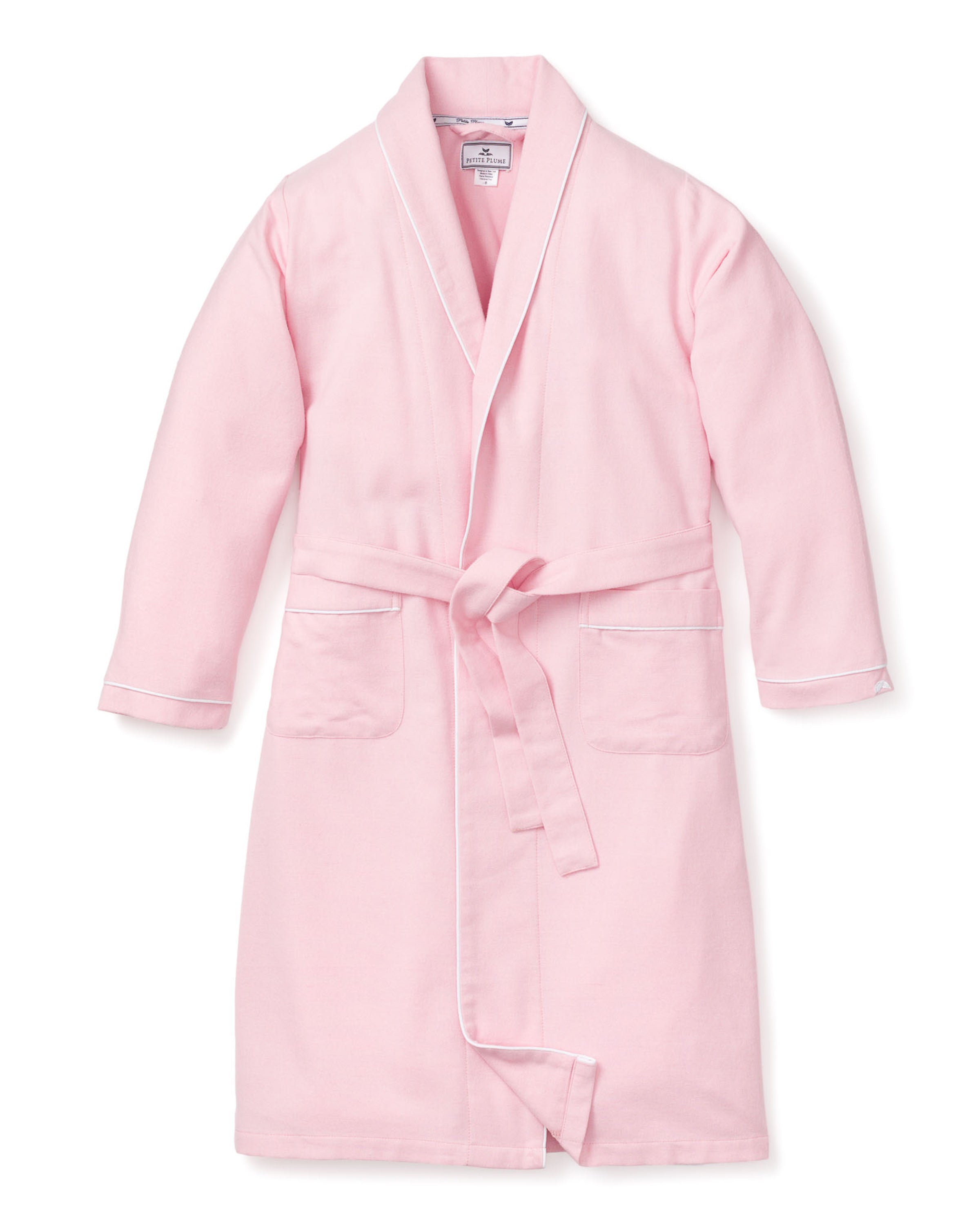 The Petite Plume Kids Flannel Robe in Pink is a chemical-free, cozy sleepwear option featuring long sleeves, a shawl collar, two front pockets, and a matching waist belt. Its perfect for kids and displayed against a plain white background.