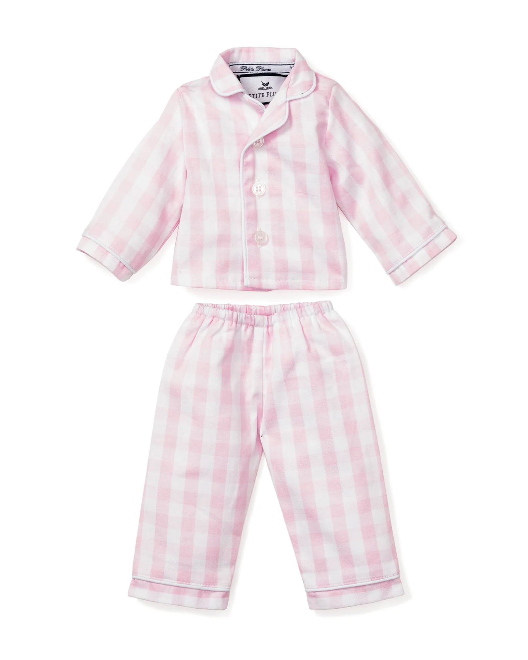 The Kid's Twill Doll Pajamas in Pink Gingham is a two-piece children’s set with a collared, long-sleeve button-up top and matching elastic-waist long pants, all in a pink and white gingham pattern.