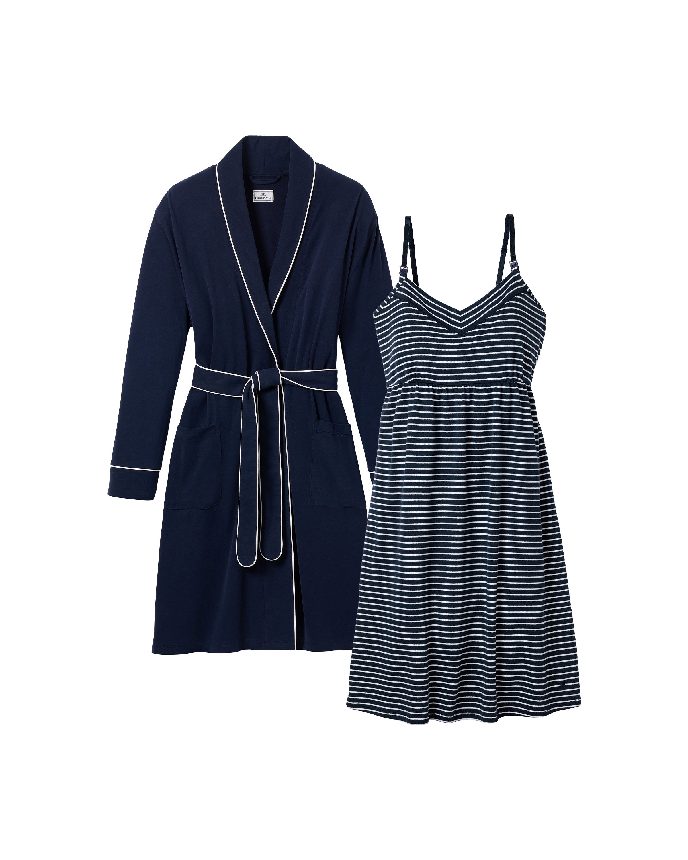 The Essential Maternity Set by Petite Plume, featuring a navy nightgown with white trim and waist tie, pairs perfectly with a black and white striped V-neck sleeveless maternity dress, offering comfort and style for your pregnancy journey.