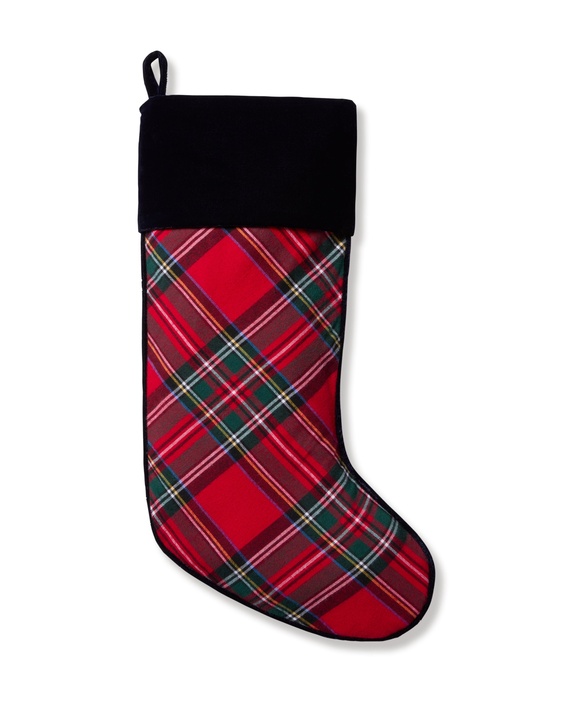 The Petite Plume Christmas Stocking in Imperial Tartan features a red, green, and white plaid design with a black cuff and hanging loop. Its traditional sock shape allows for monogramming to add a personal touch.