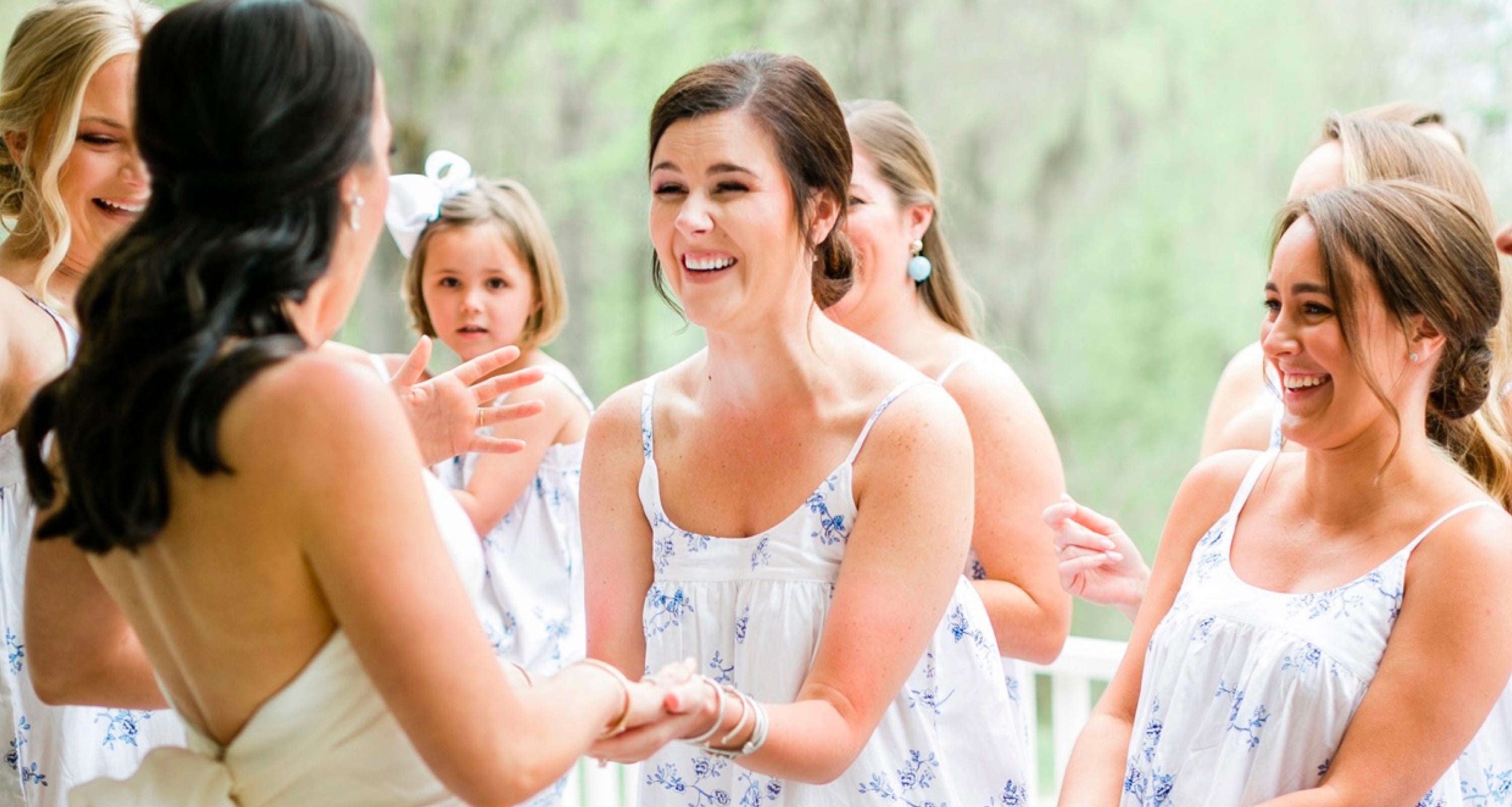  Group of women smiling at a bride