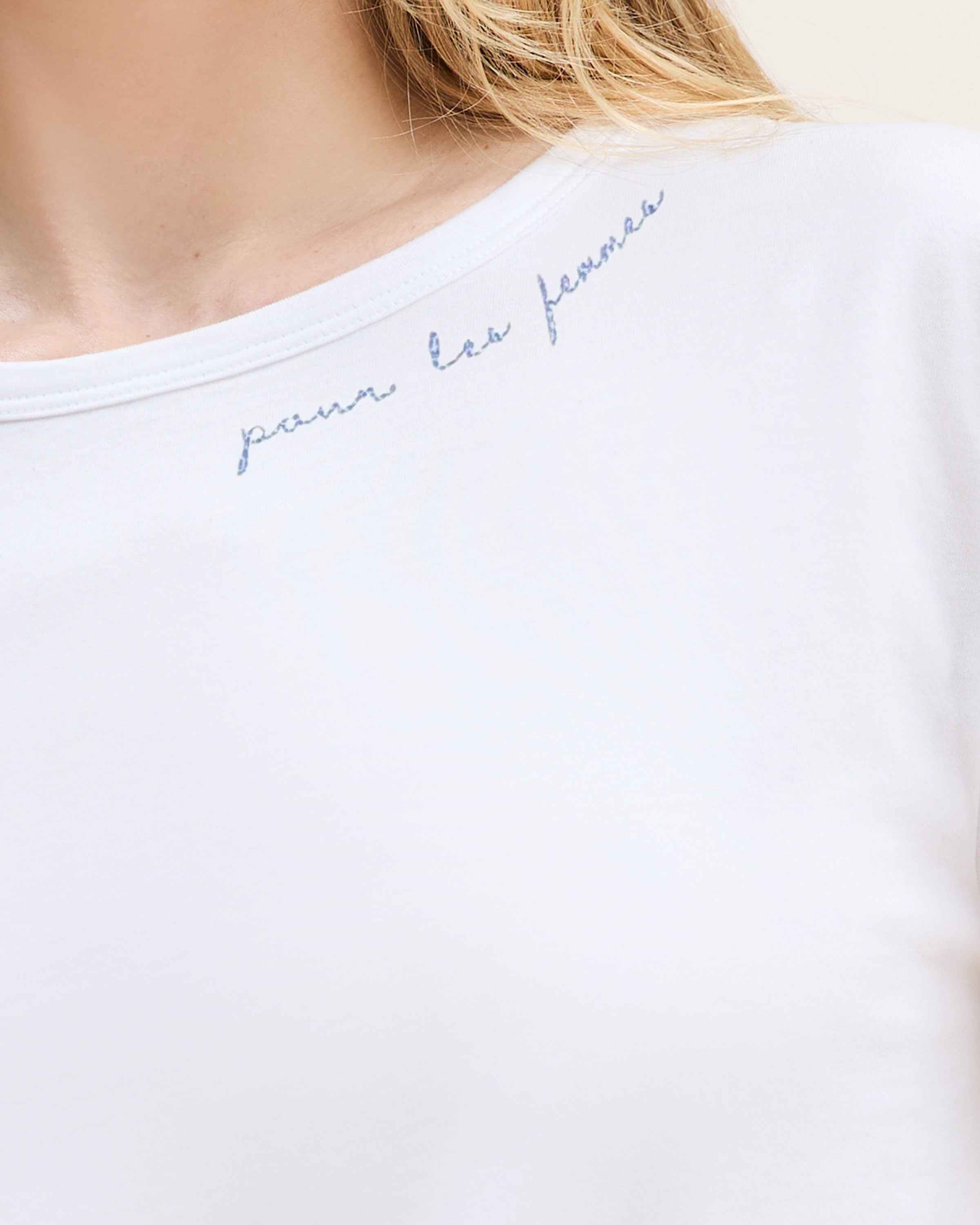 Close-up of a woman wearing the Women's Pima Essential Crew Neck Tee with 