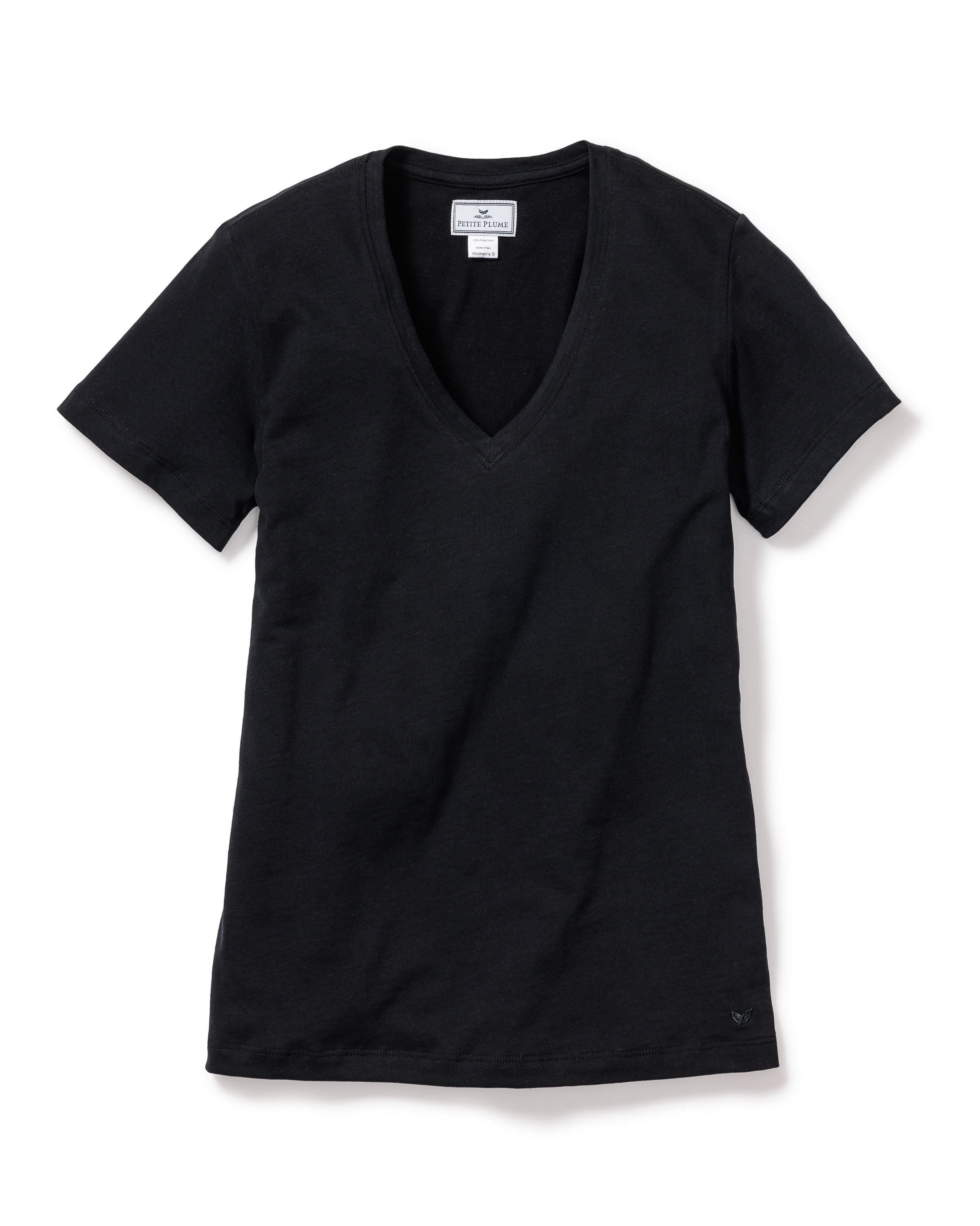 The Womens Pima Short Sleeve Top in Black by Petite Plume, made from soft Peruvian Pima cotton jersey knit, stands out on a white background. This simple, elegant V-neck with short sleeves has a white tag in the neckline at the back, highlighting its quality craftsmanship.