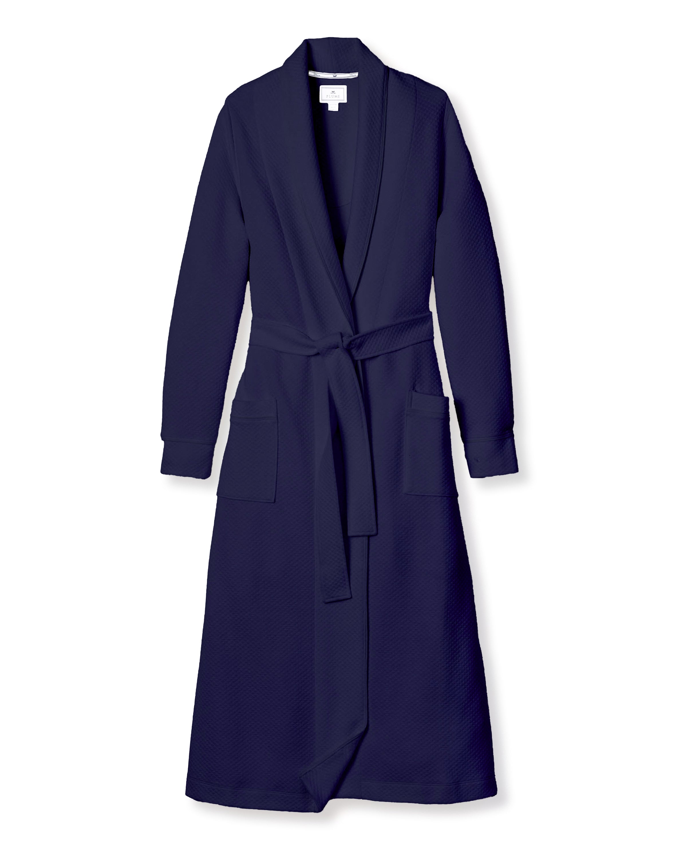 The Womens Pima Ophelia Robe by Petite Plume, in Blue Dusk Jacquard, features textured fabric with a quilted effect, a matching belt, two front pockets, and a shawl collar—all displayed on a plain white background.