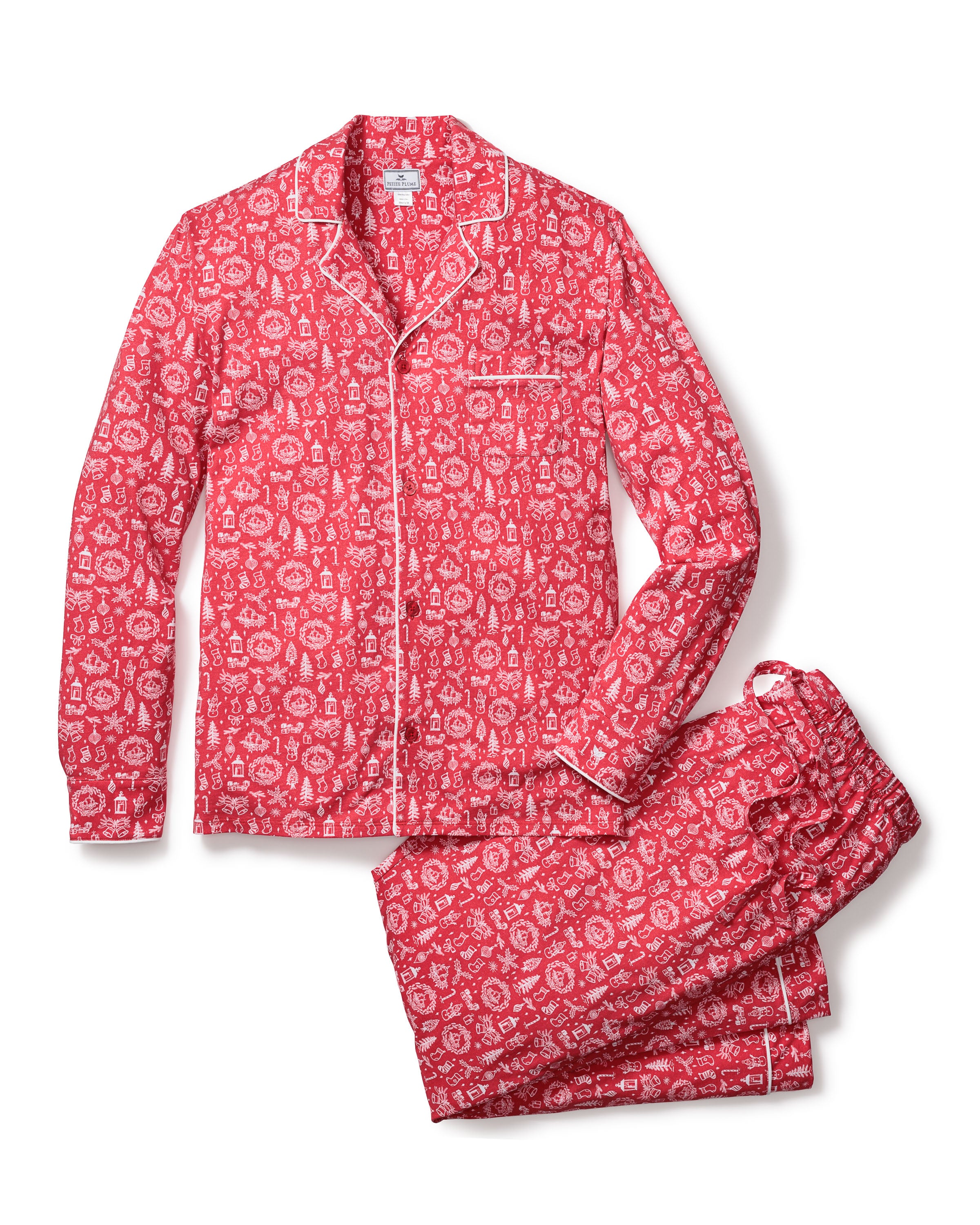Explore the luxury of Petite Plumes Mens Pima Pajama Set in Whimsical Winter, crafted from opulent Peruvian Pima cotton. This red set features a long-sleeve button-up top with a chest pocket and matching pants, embellished with floral and geometric motifs, all elegantly trimmed in white piping.