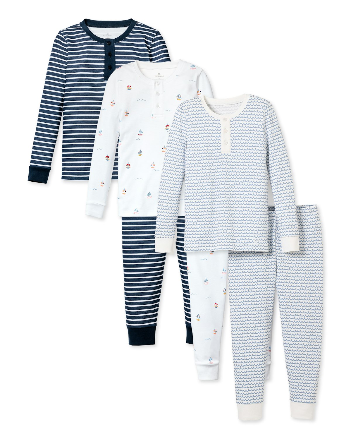 Four sets of Petite Plumes Boys Pima Snug Fit Pajama Trio are featured: two in navy and white stripes and two with sailboat patterns. Made from soft Pima cotton, each includes a buttoned long-sleeve top and matching pants, offering premium comfort in childrens sleepwear.