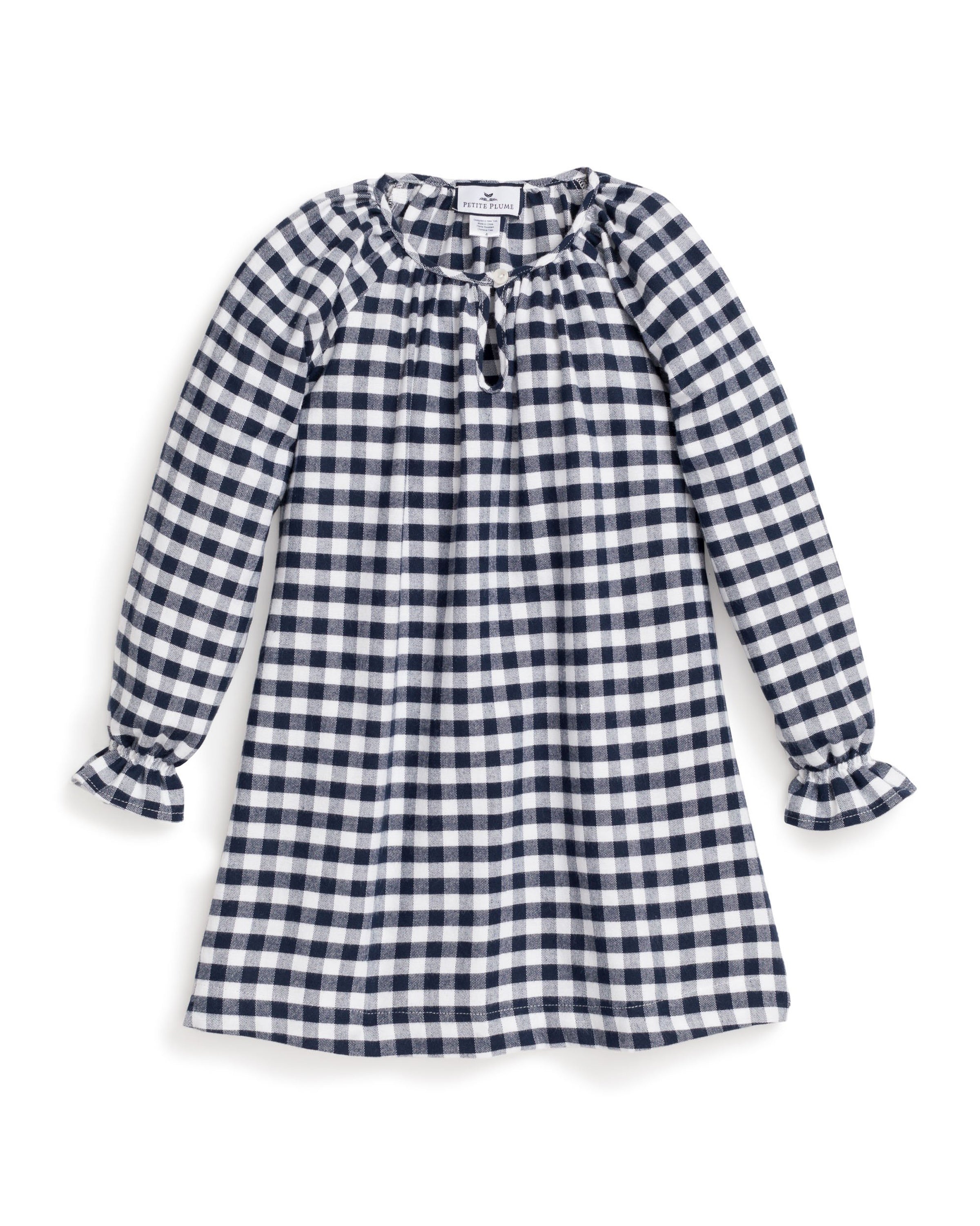 A long-sleeve dress with navy and white gingham print features a gathered neckline with a small tie, ruffled cuffs, and an A-line shape, reminiscent of Petite Plumes Girls Flannel Delphine Nightgown.