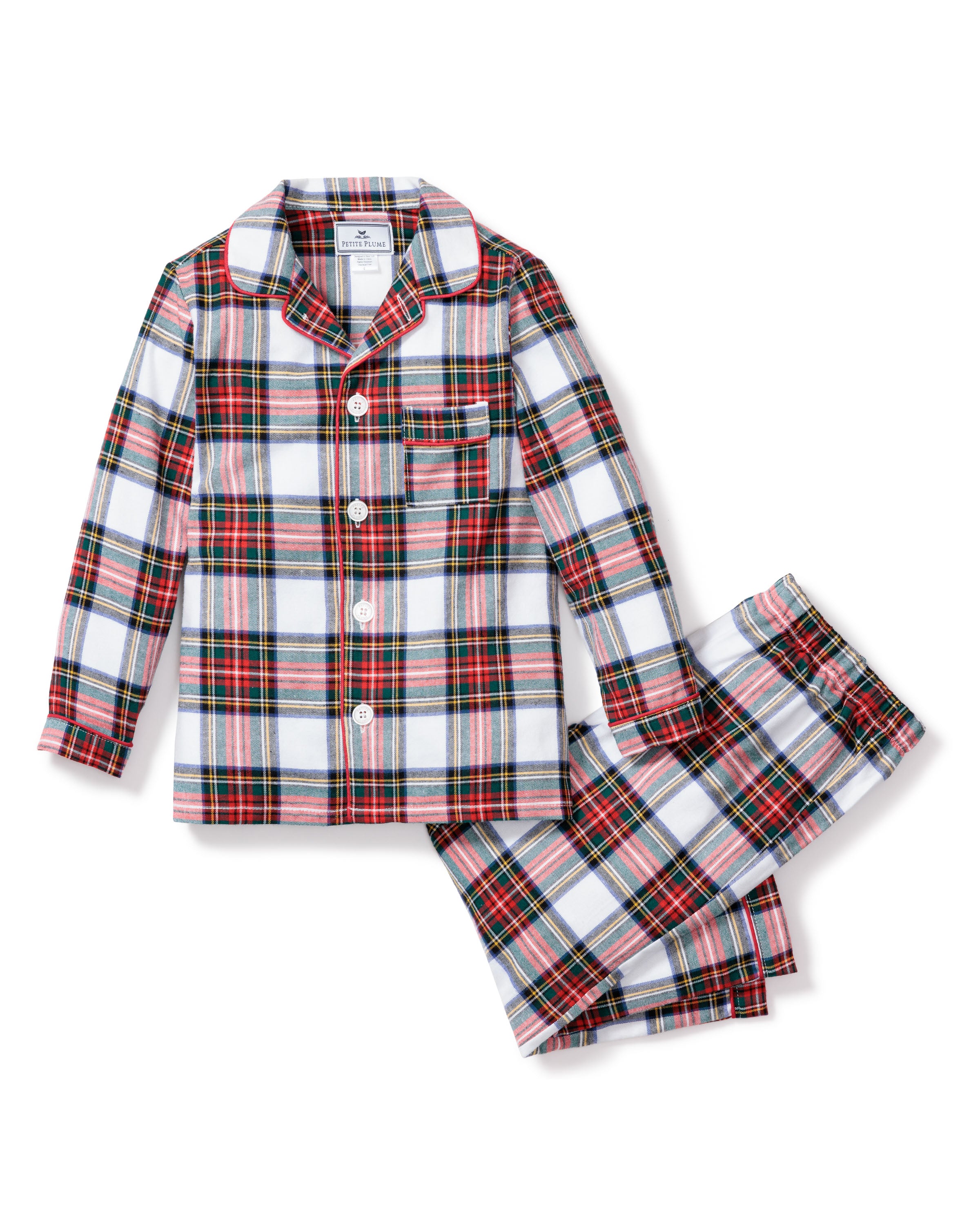The Kids Brushed Cotton Pajama Set in Balmoral Tartan by Petite Plume includes a soft, yarn-dyed cotton plaid with a red, green, and white pattern. It features a button-up long-sleeve shirt with a front pocket and matching pants for lasting comfort.