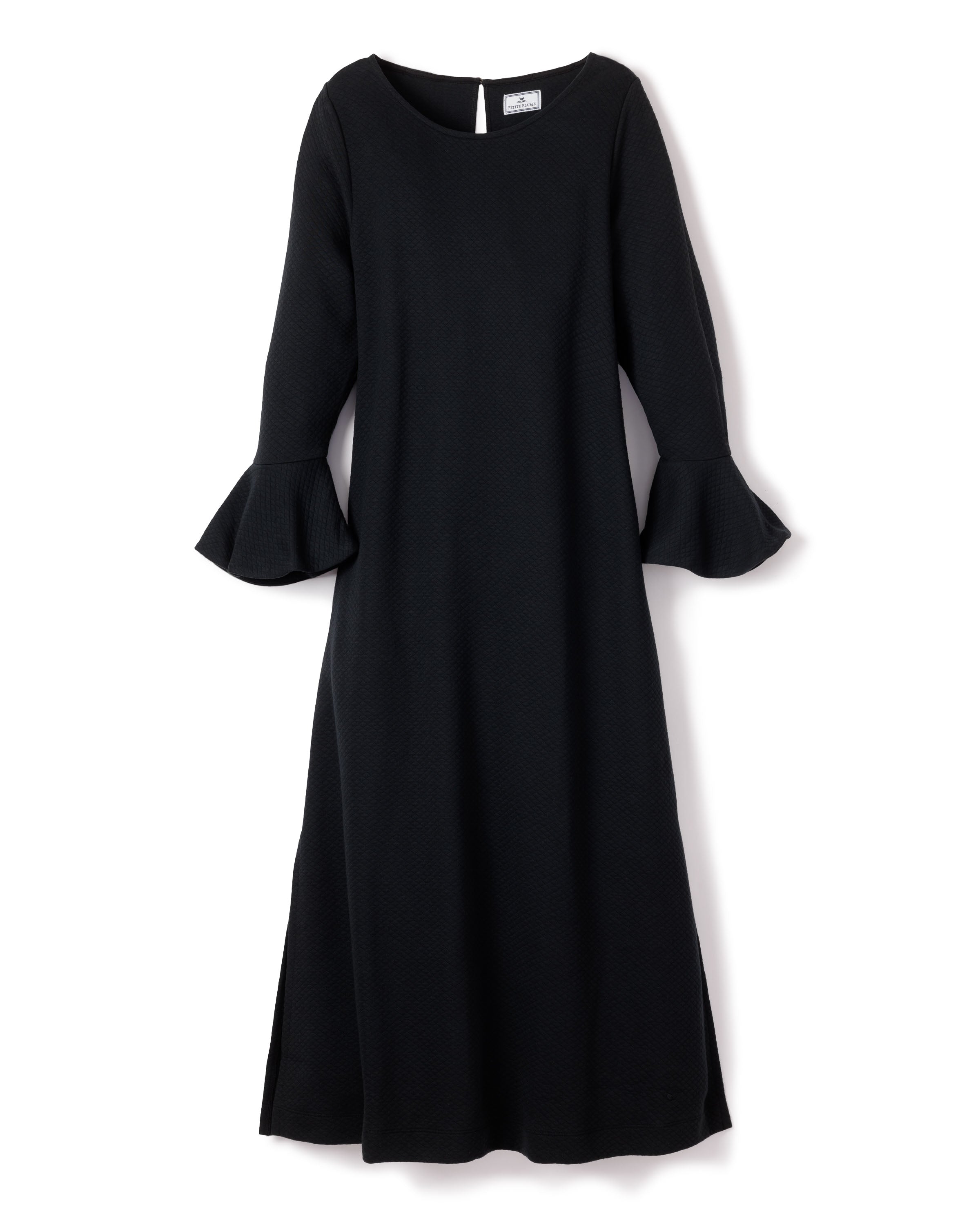 Experience luxury with the Womens Pima Ophelia Nightgown in Black by Petite Plume. This long-sleeved piece features a textured pattern, flared cuffs, and a round neckline. Falling to mid-calf, its elegant design adds sophistication to any refined wardrobe.