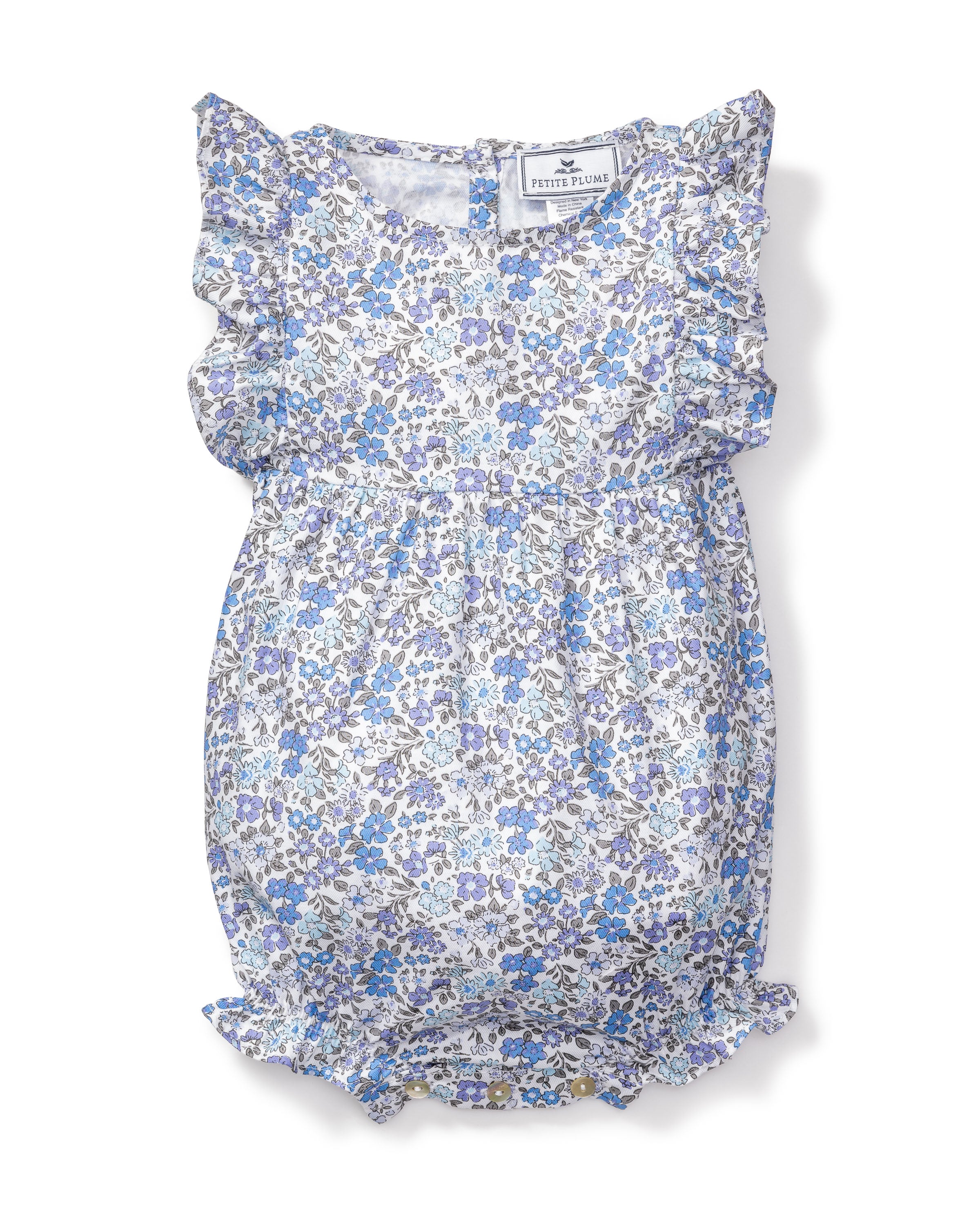 The Babys Twill Ruffled Romper in Fleur DAzur by Petite Plume showcases a vintage-inspired print of blue and white flowers, with ruffled sleeves and leg openings, a gathered waist, and a small neckline button. Its yarn-dyed cotton design adds a delicate and charming touch.