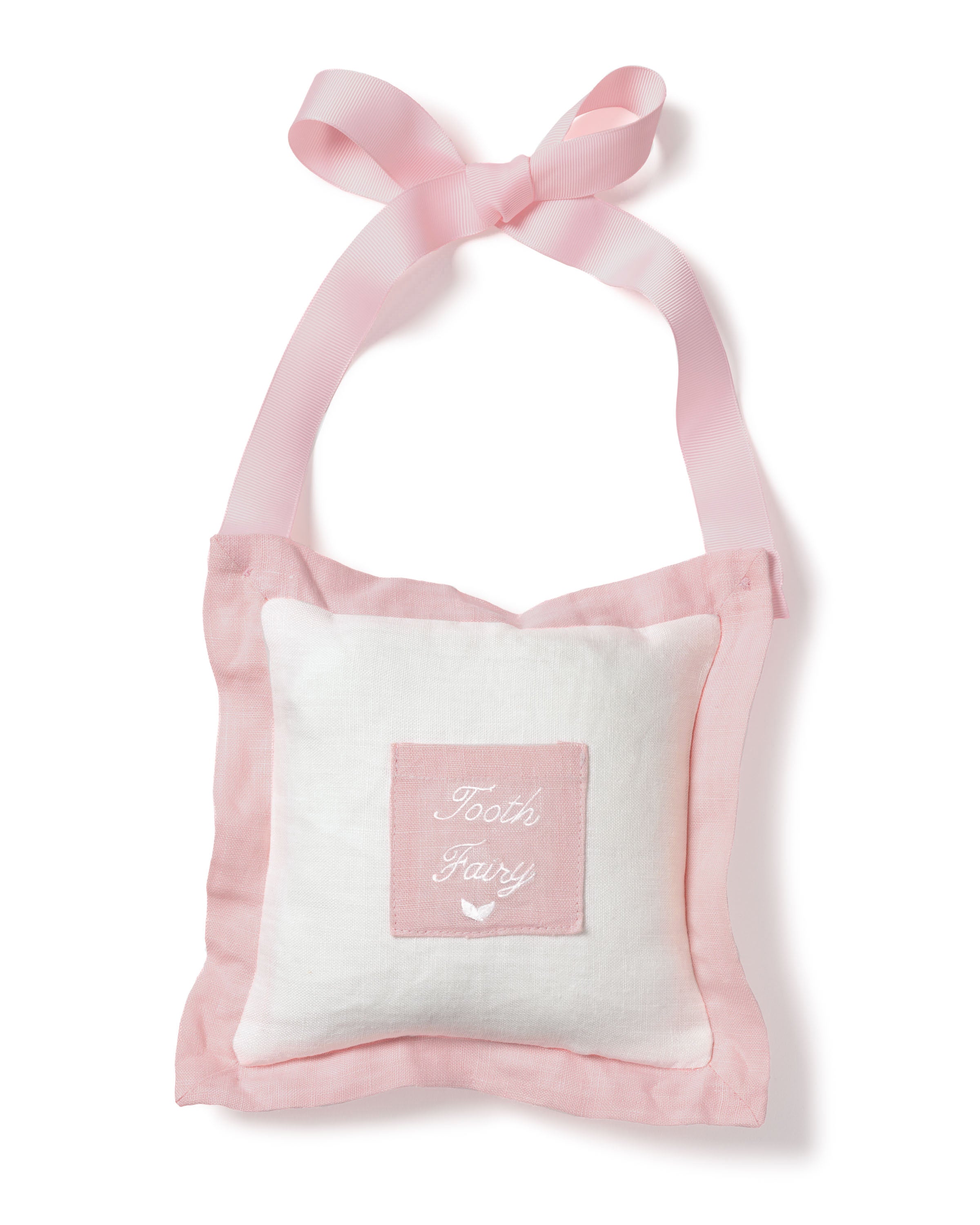 The Petite Plume Pink Tooth Fairy Pillow is a small, white pillow bordered in pink with a ribbon and features an embroidered front pocket labeled Tooth Fairy in elegant white stitching. A charming bow at the top completes its heirloom-quality design.