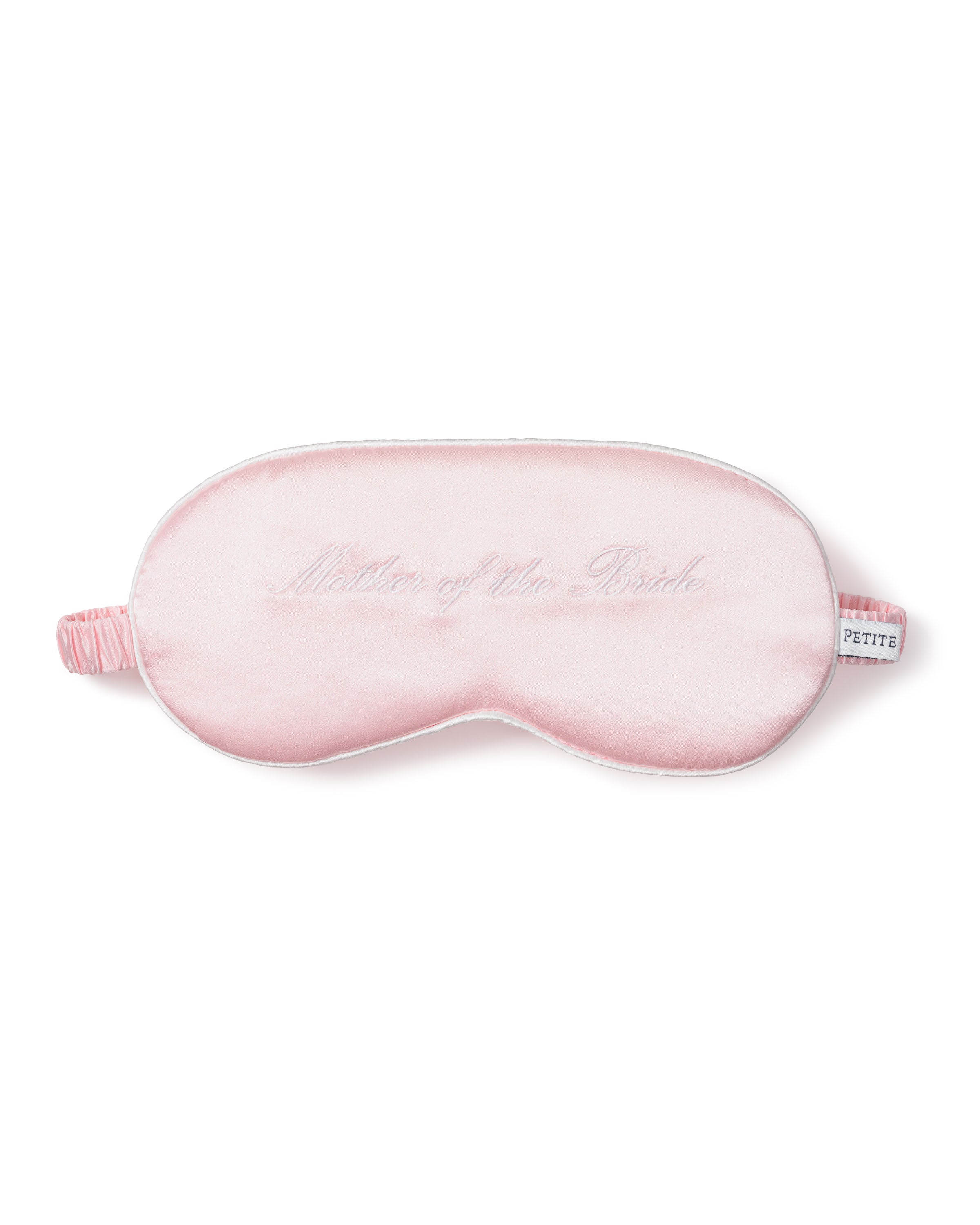 The Womens Silk Mother of the Bride Sleep Mask by Petite Plume makes an ideal wedding gift, featuring pink silk with delicate embroidered text, white piping, and an adjustable strap for comfort and style.