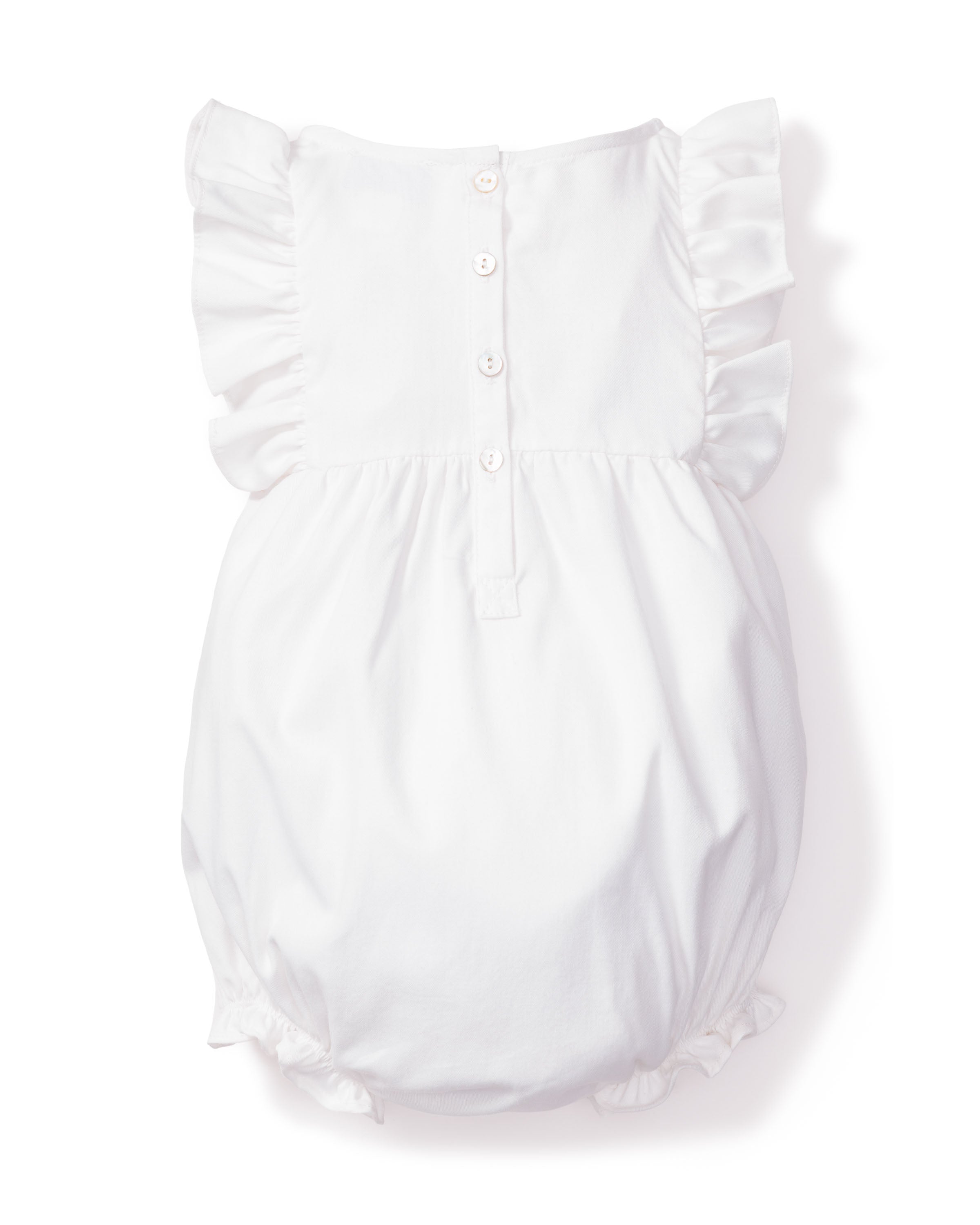 The Babys Twill Ruffled Romper in White by Petite Plume is a stylish and comfortable romper with ruffled sleeves and leg openings, made from yarn-dyed cotton. It features back buttons for easy closure.