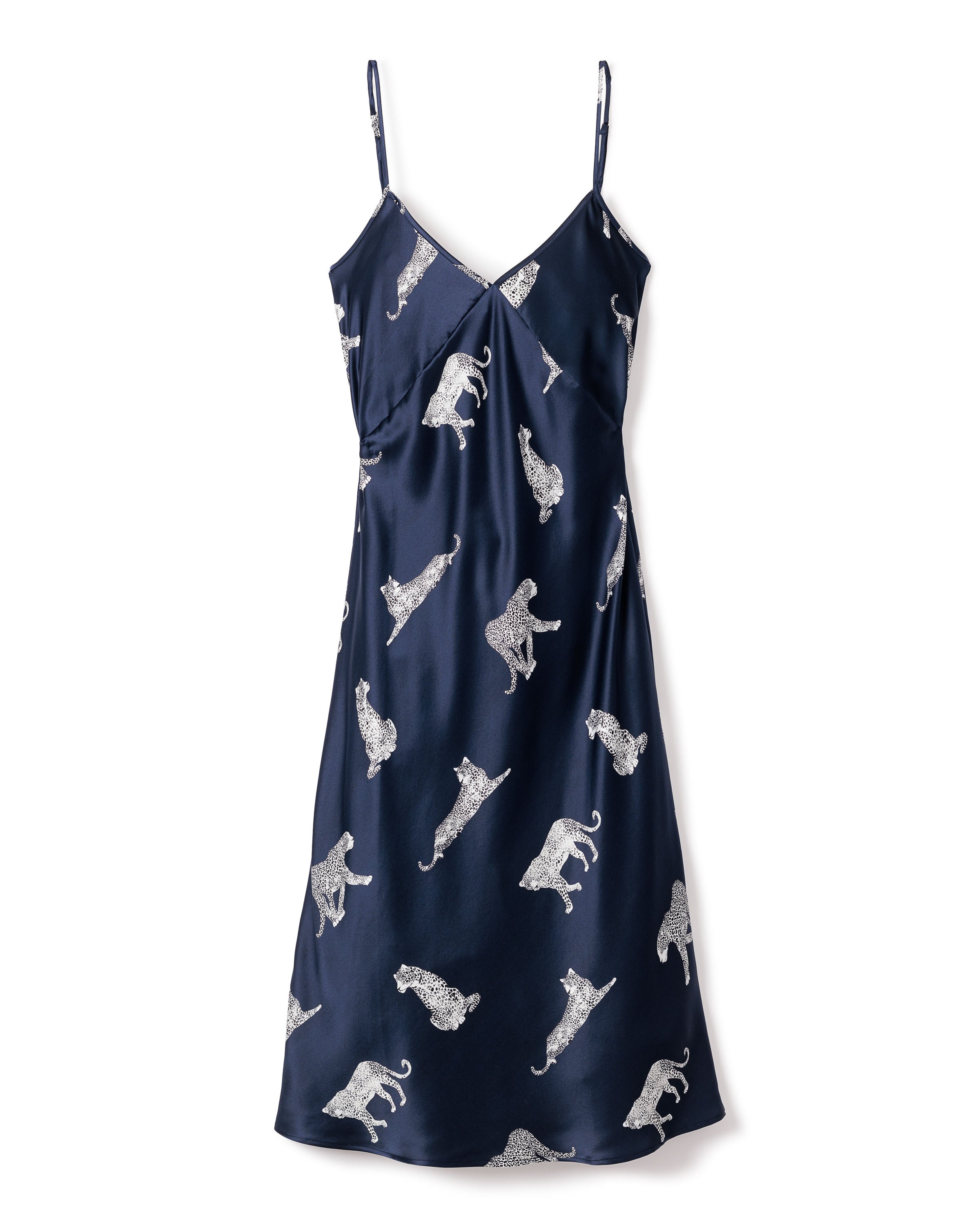 The Womens Silk Cosette Nightgown in Panthère de Nuit by Petite Plume is a navy blue nightdress with thin straps, made from Mulberry silk and featuring silver embroidered animals like leopards and monkeys.