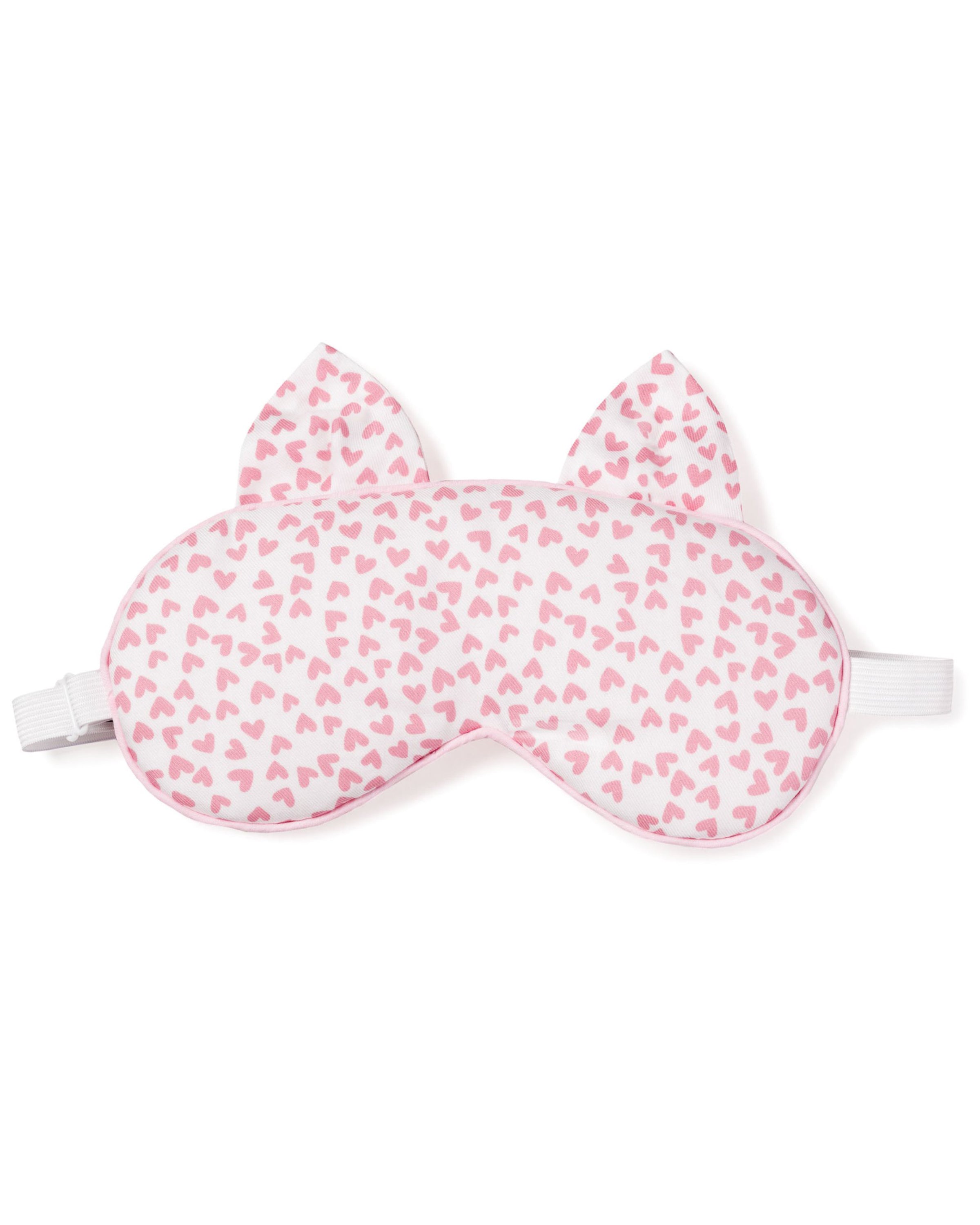 The Petite Plume Adults Kitty Sleep Mask in Sweethearts is a charming white mask featuring pink heart patterns and cat ears, complete with an elastic strap for a secure fit. Its the perfect stylish gift for anyone who loves a good nights sleep.