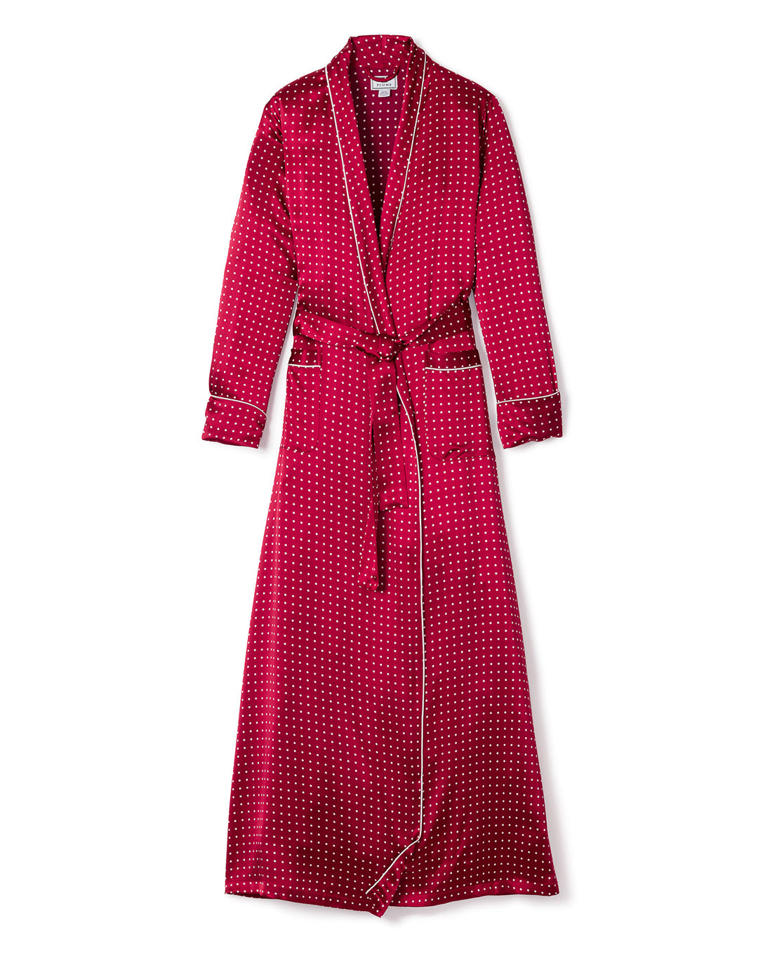 The Womens Silk Long Robe in Bordeaux Polka Dot by Petite Plume features a shawl collar, matching belt, and two pockets with white piping. This maroon robes white polka dot pattern adds a luxurious touch for sleepwear enthusiasts.