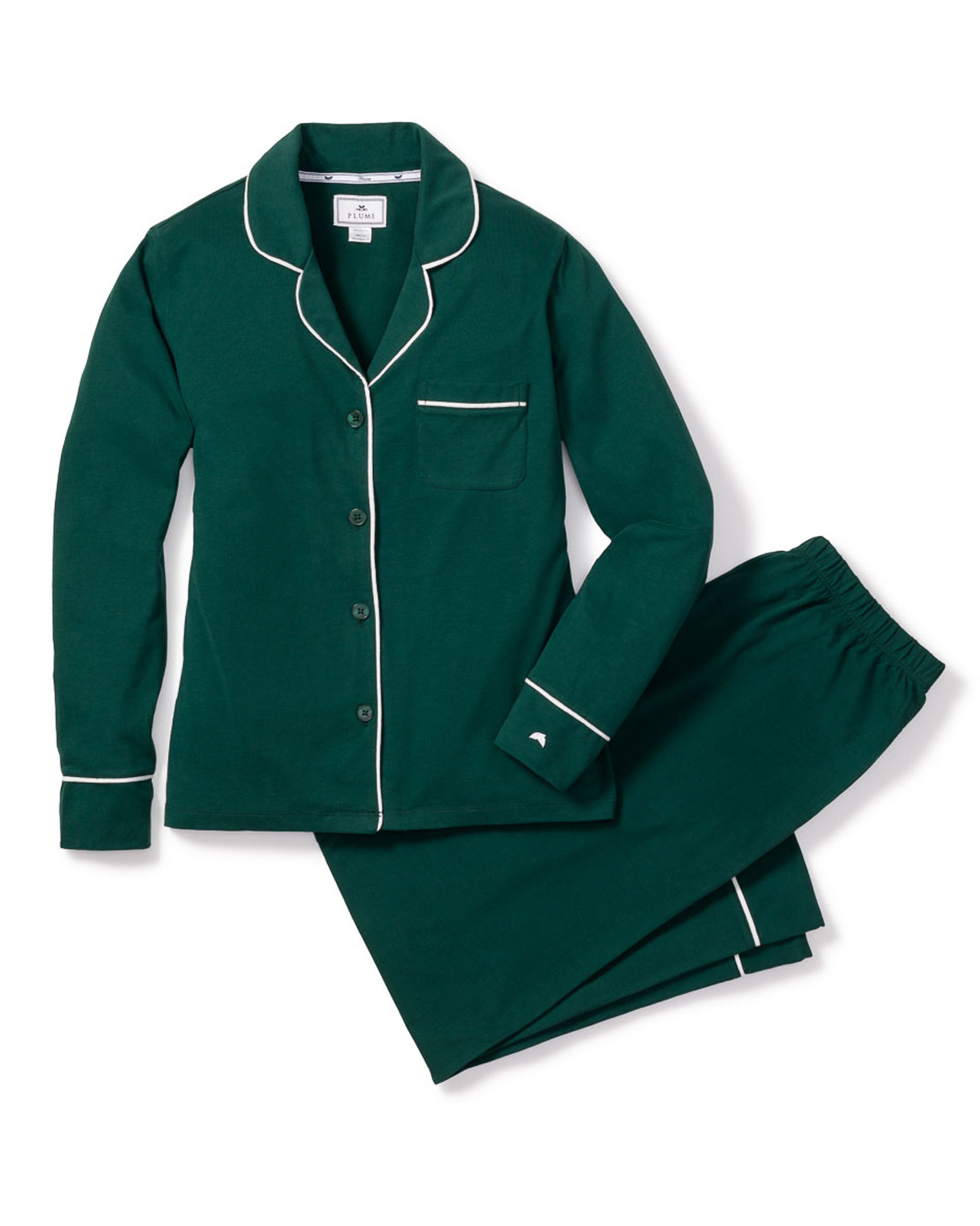 The Womens Pima Pajama Set in Evergreen by Petite Plume features a luxurious dark green color with white piping, a long-sleeve button-up top with chest pocket, and matching long pants for unparalleled comfort.